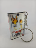Stir Crazy VHS keyring — front cover standing angled 3