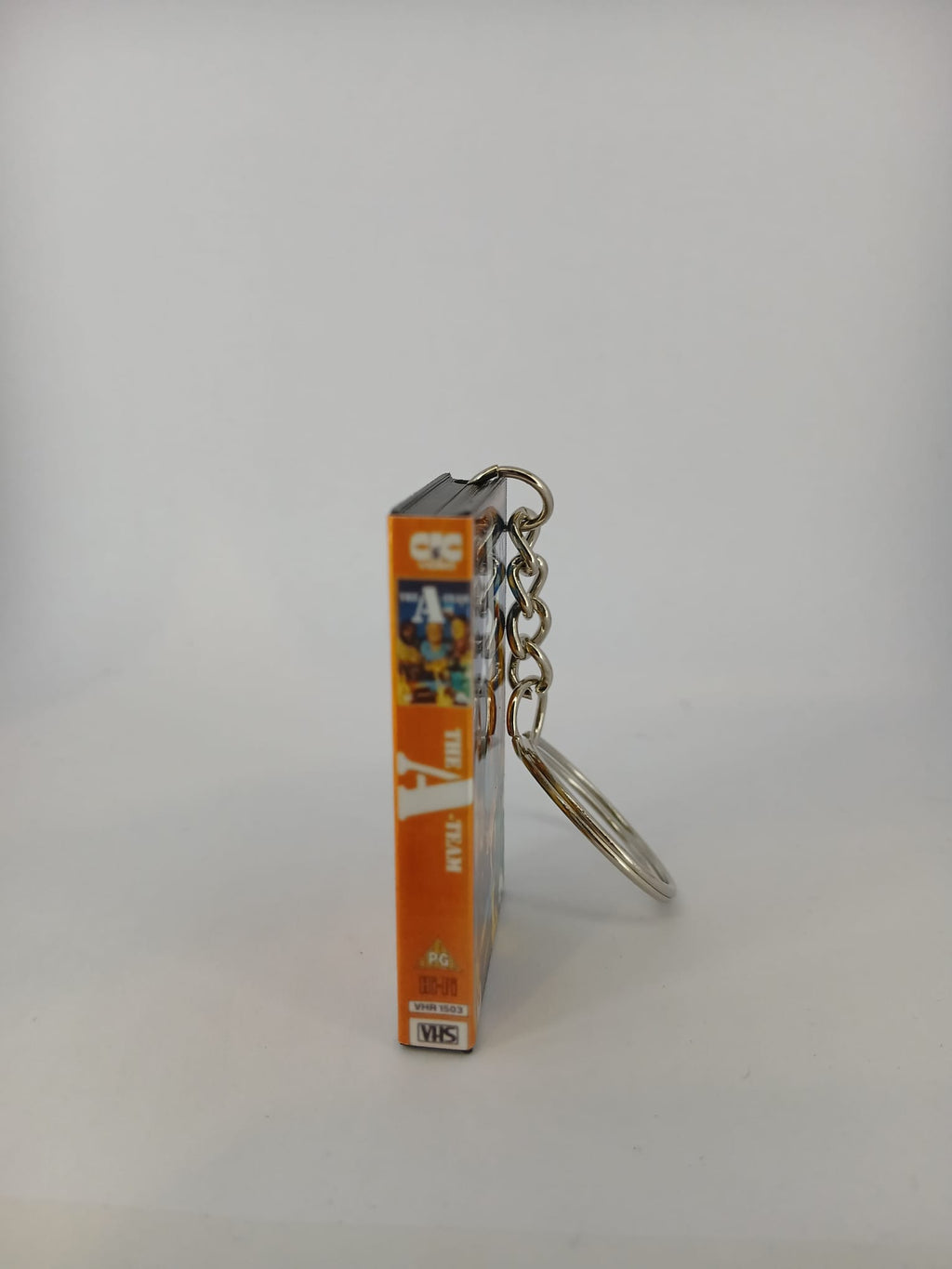 The A-Team VHS keyring — back and spine angled view standing