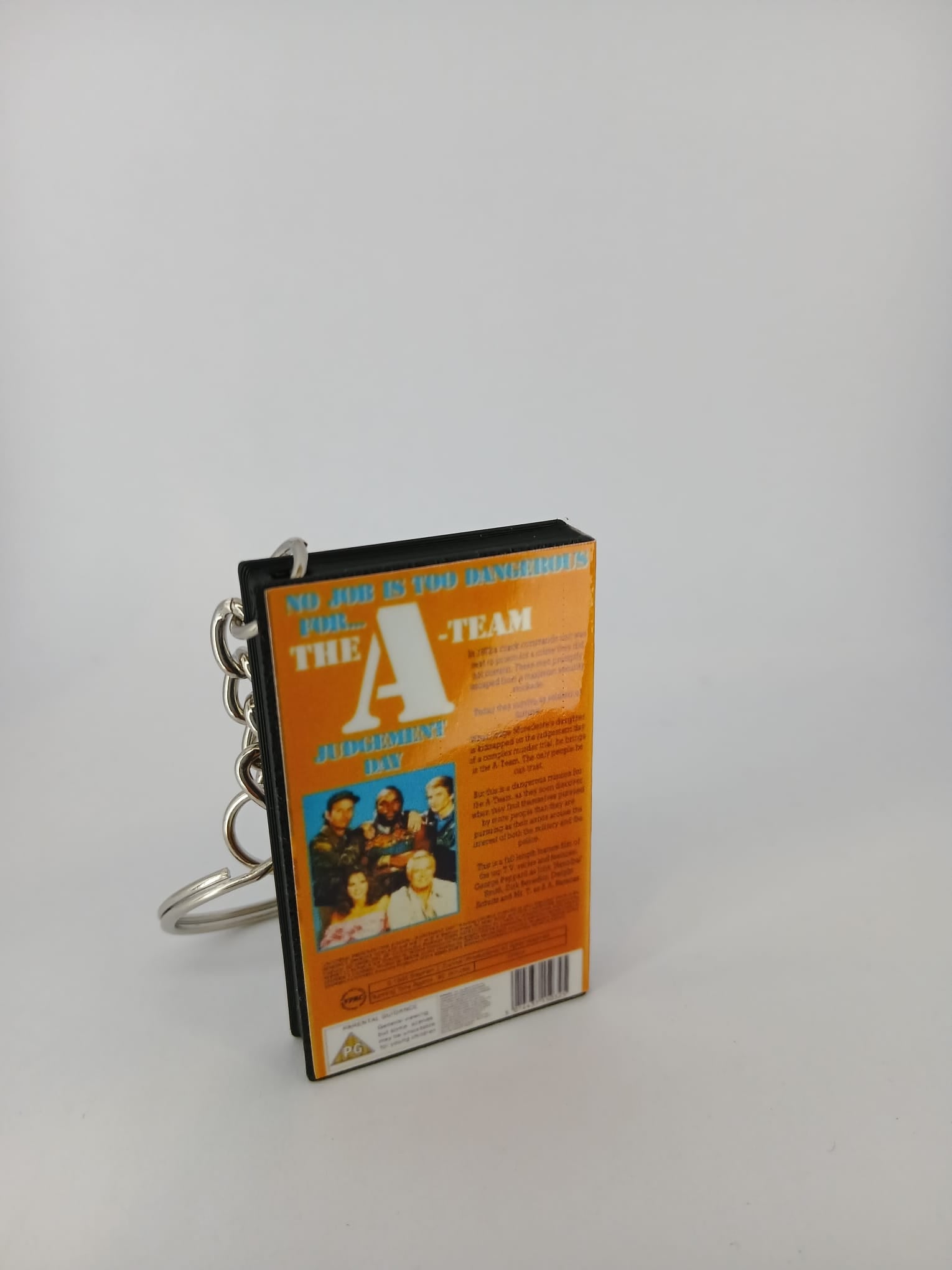 The A-Team VHS keyring — front cover standing angled 2