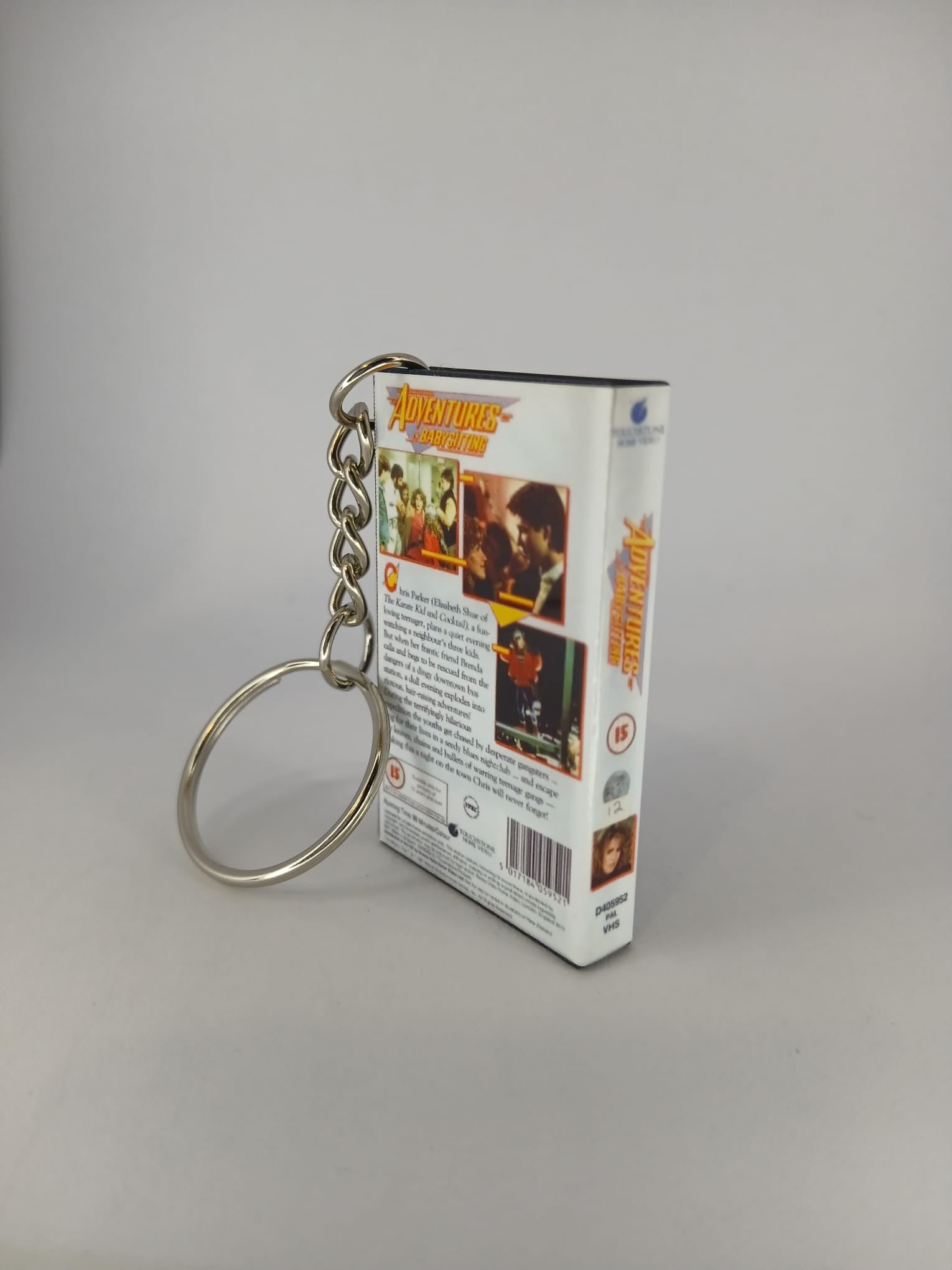 Adventures in Babysitting Mini VHS Keyring – front spine angle