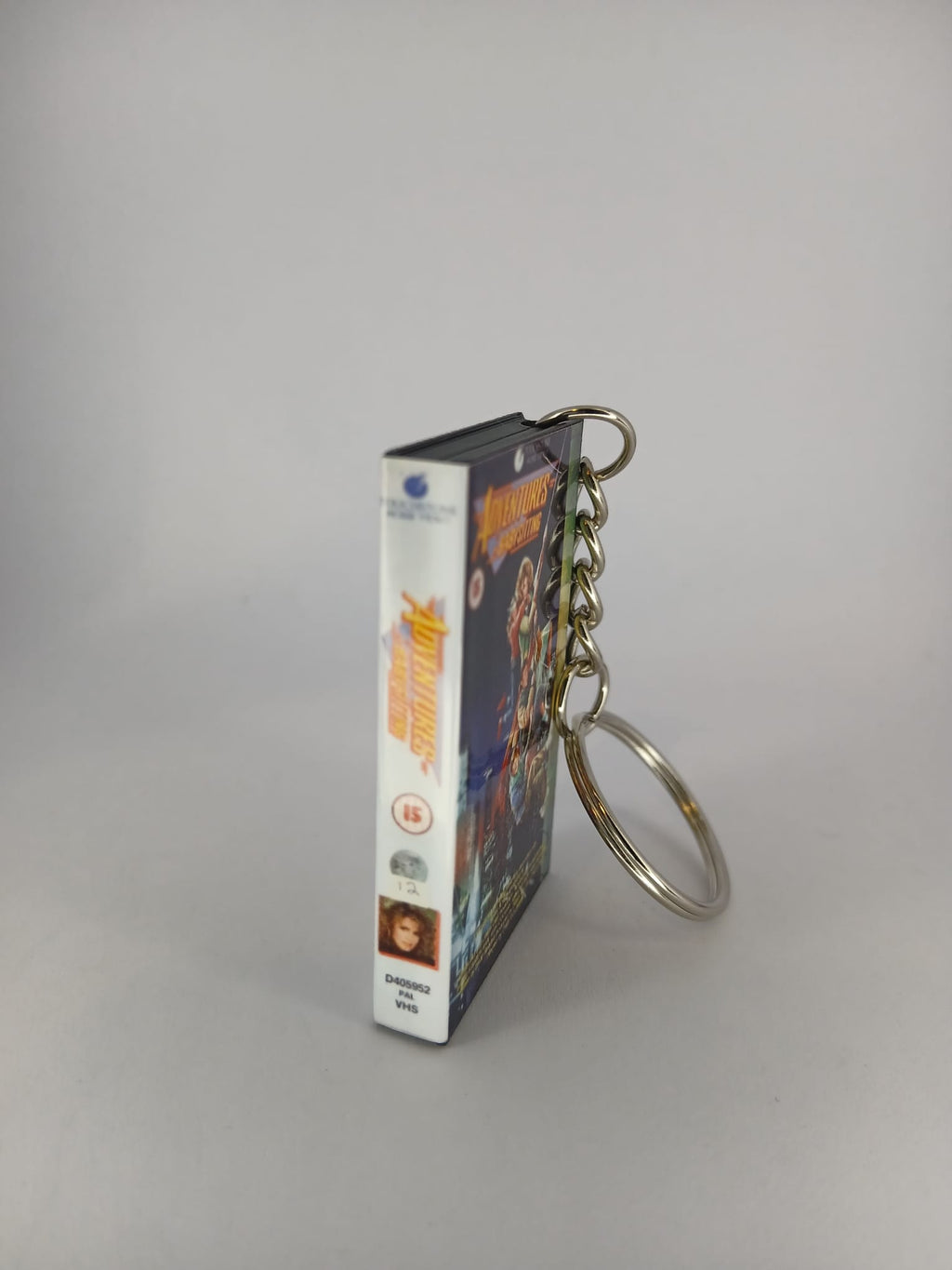 Adventures in Babysitting Mini VHS Keyring – flat lay overhead