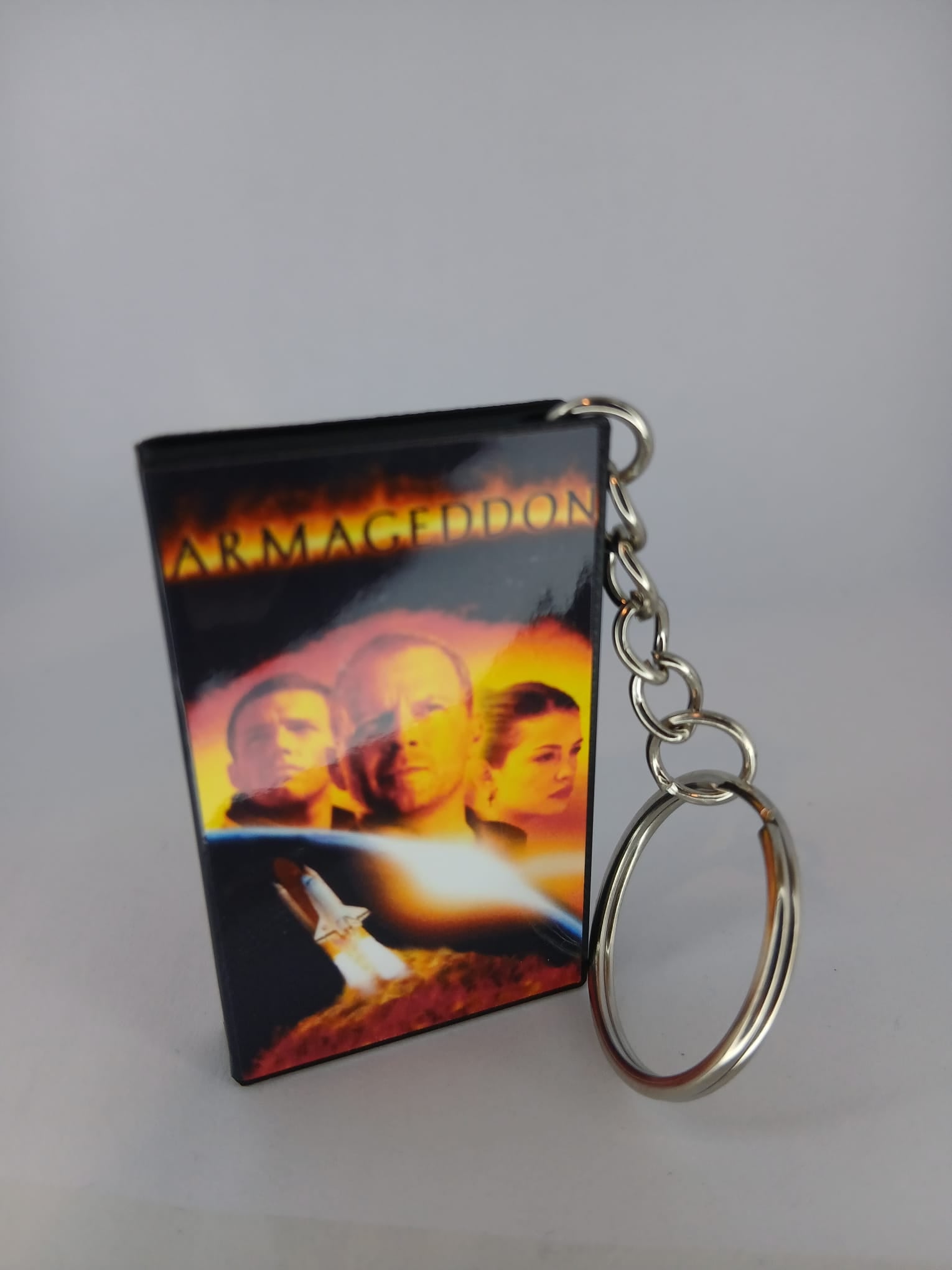 Armageddon VHS keyring — front cover close-up angled