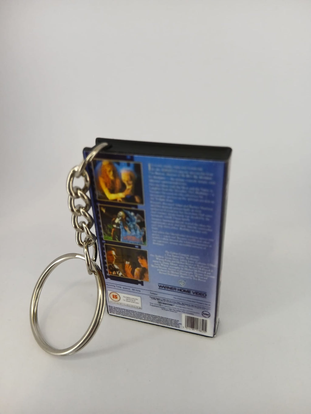 Beetlejuice VHS keyring — spine view standing