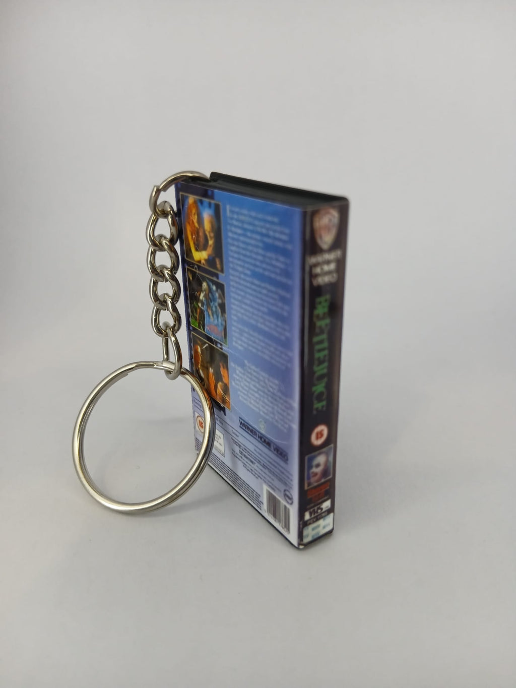 Beetlejuice VHS keyring — front cover standing angled