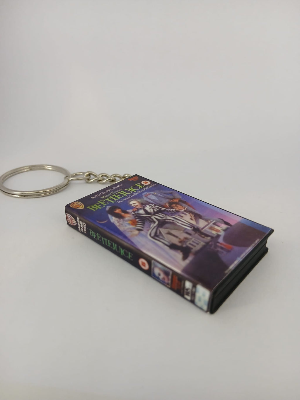 Beetlejuice VHS keyring — front cover standing angled 2