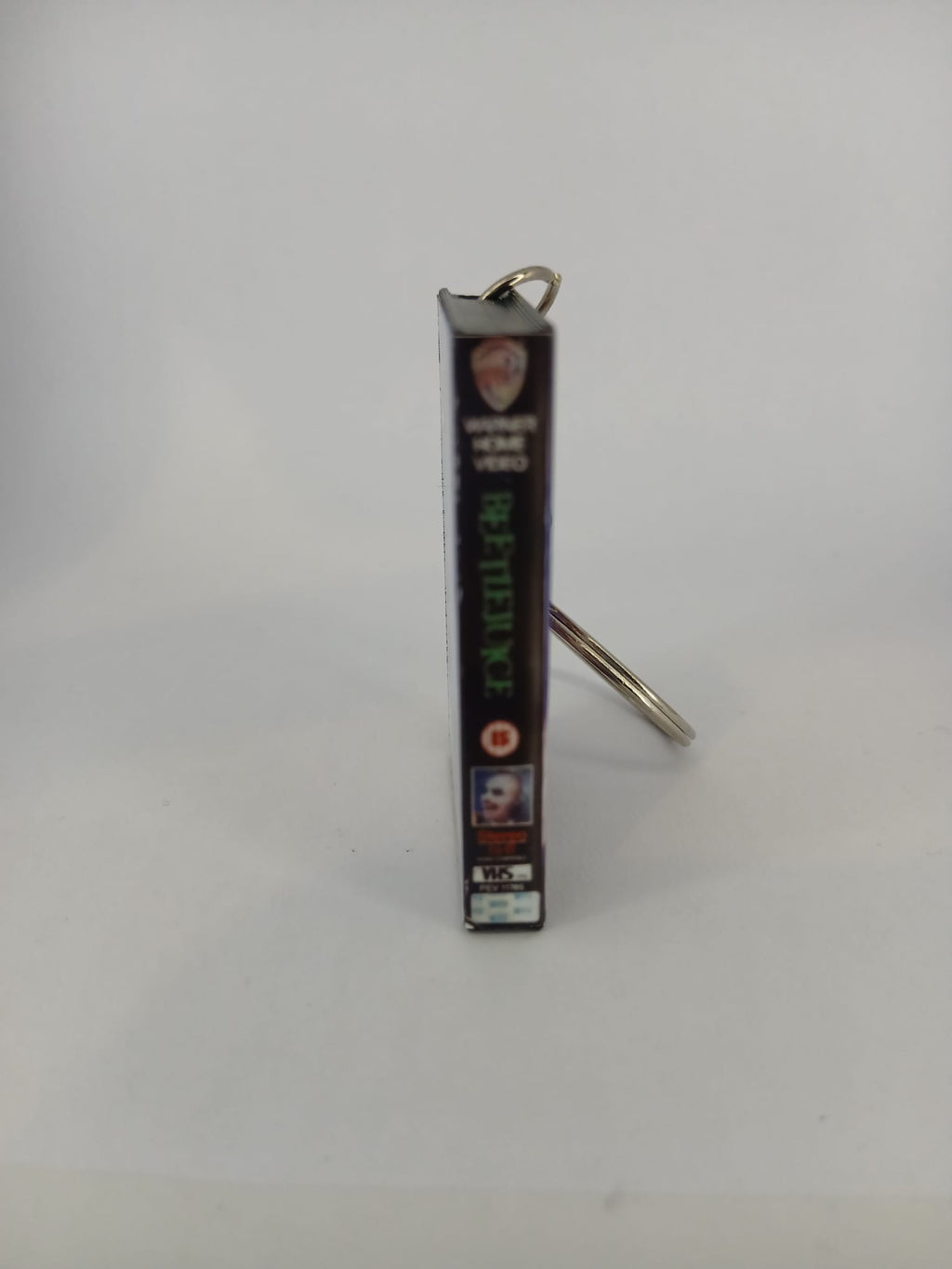 Beetlejuice VHS keyring — front cover standing angled 3