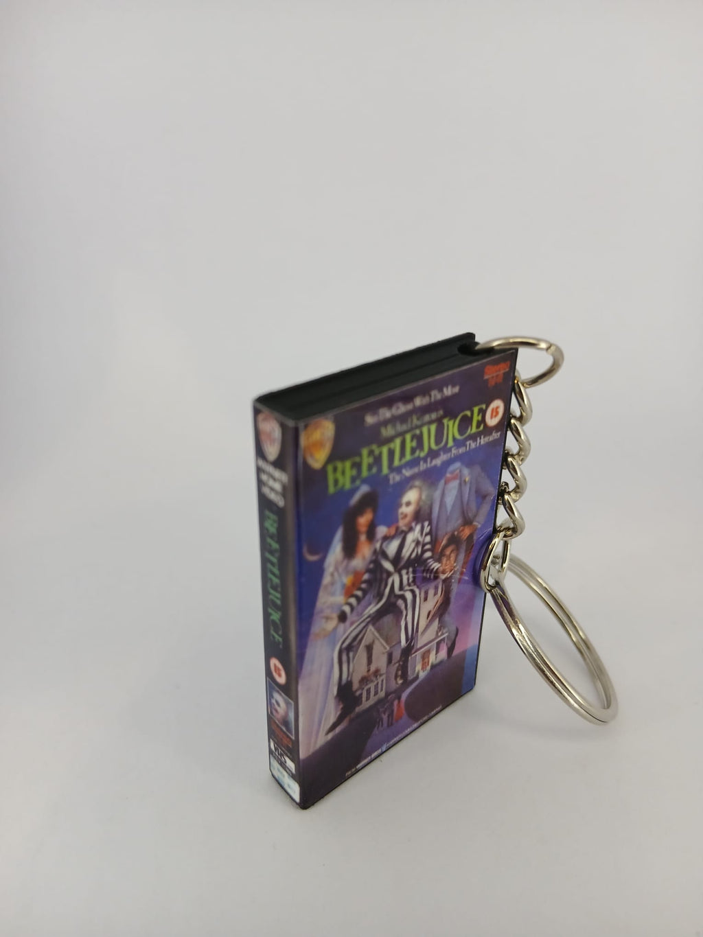 Beetlejuice VHS keyring — front cover standing angled 4