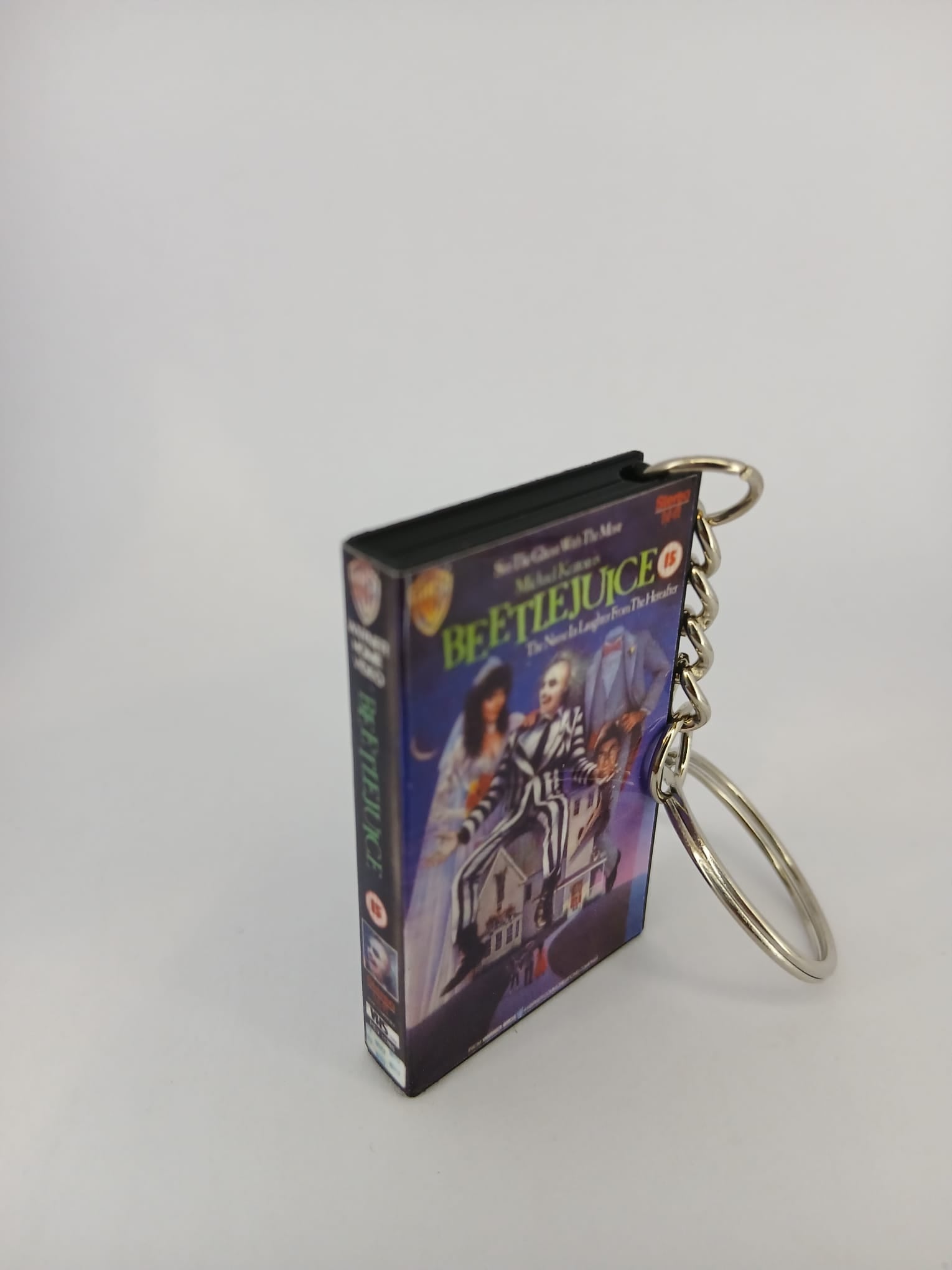 Beetlejuice VHS keyring — front cover standing angled 4