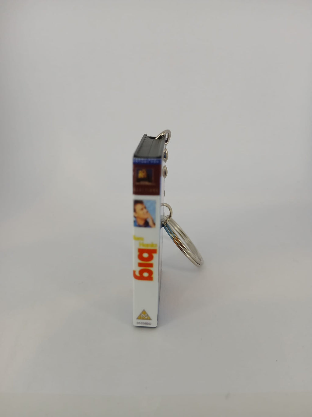 Big VHS keyring — front cover standing angled