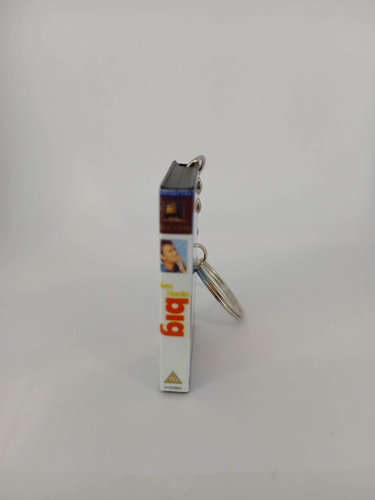 Big VHS keyring — front cover standing angled