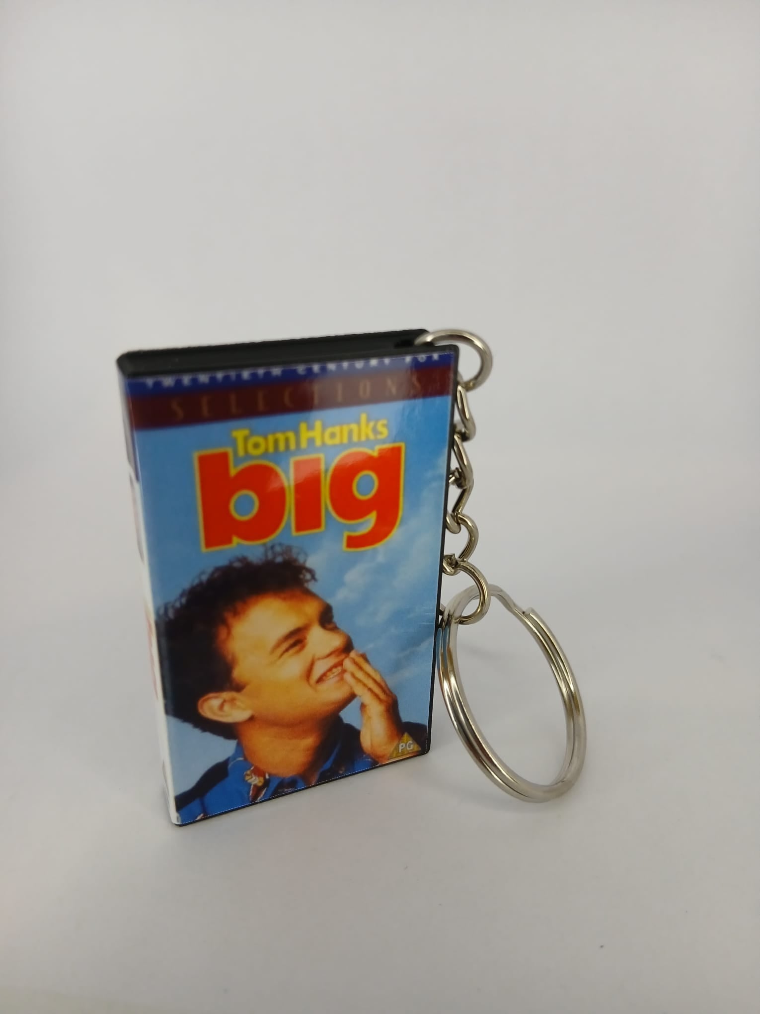 Big VHS keyring — front cover standing angled 3