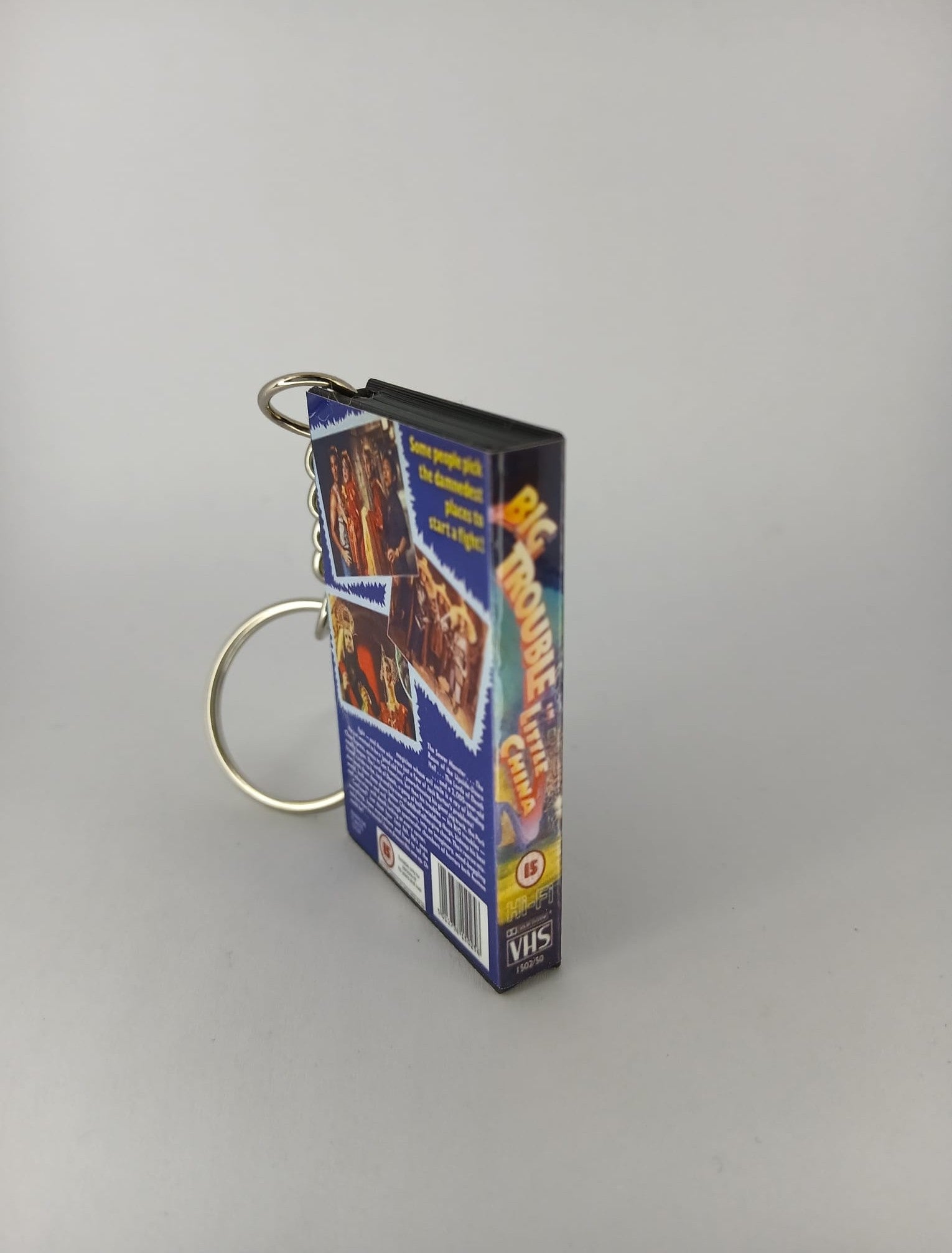 Big Trouble in Little China VHS keyring — back and spine angled view standing