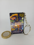 Big Trouble in Little China VHS keyring — front cover standing with coin for scale