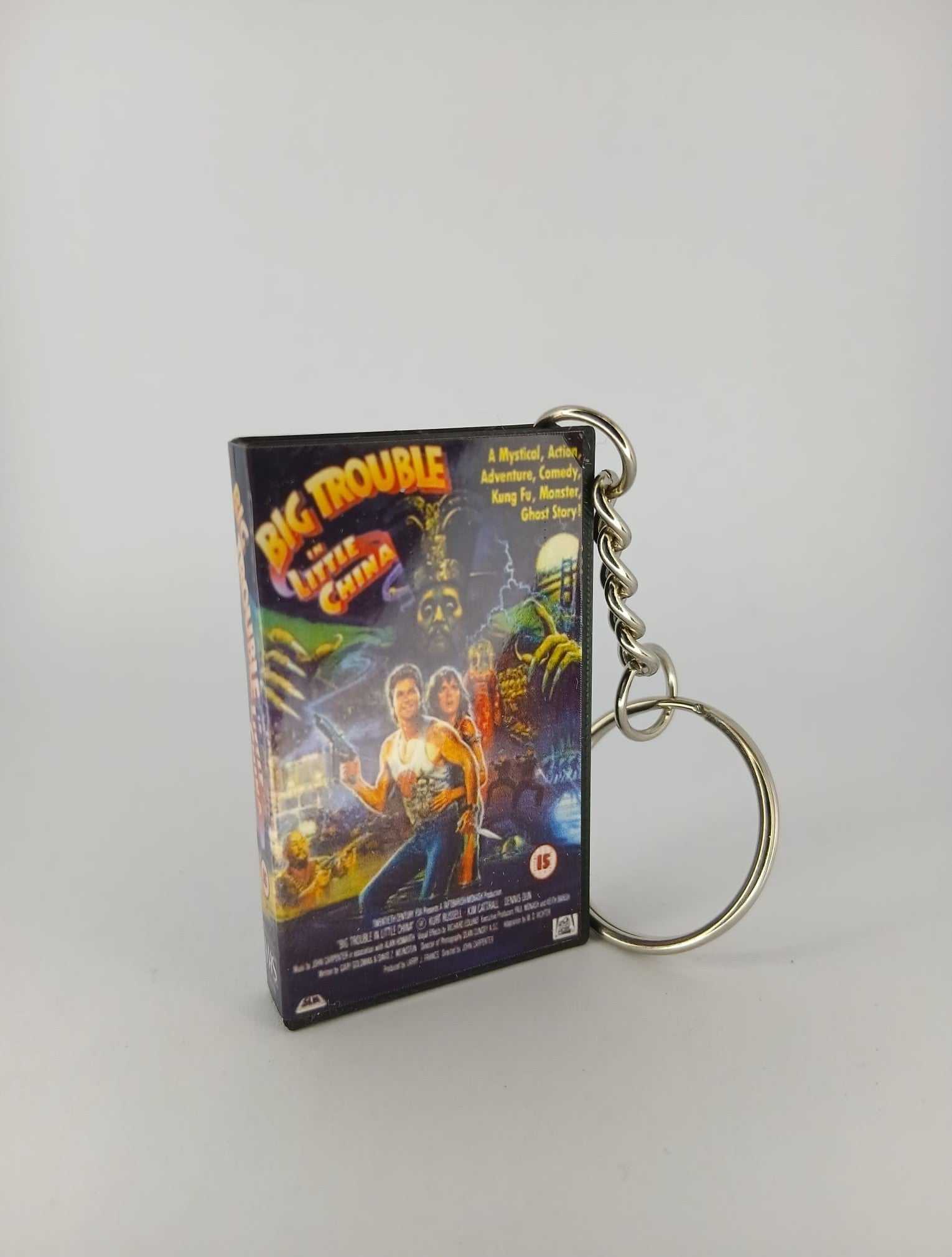 Big Trouble in Little China VHS keyring — front cover standing angled