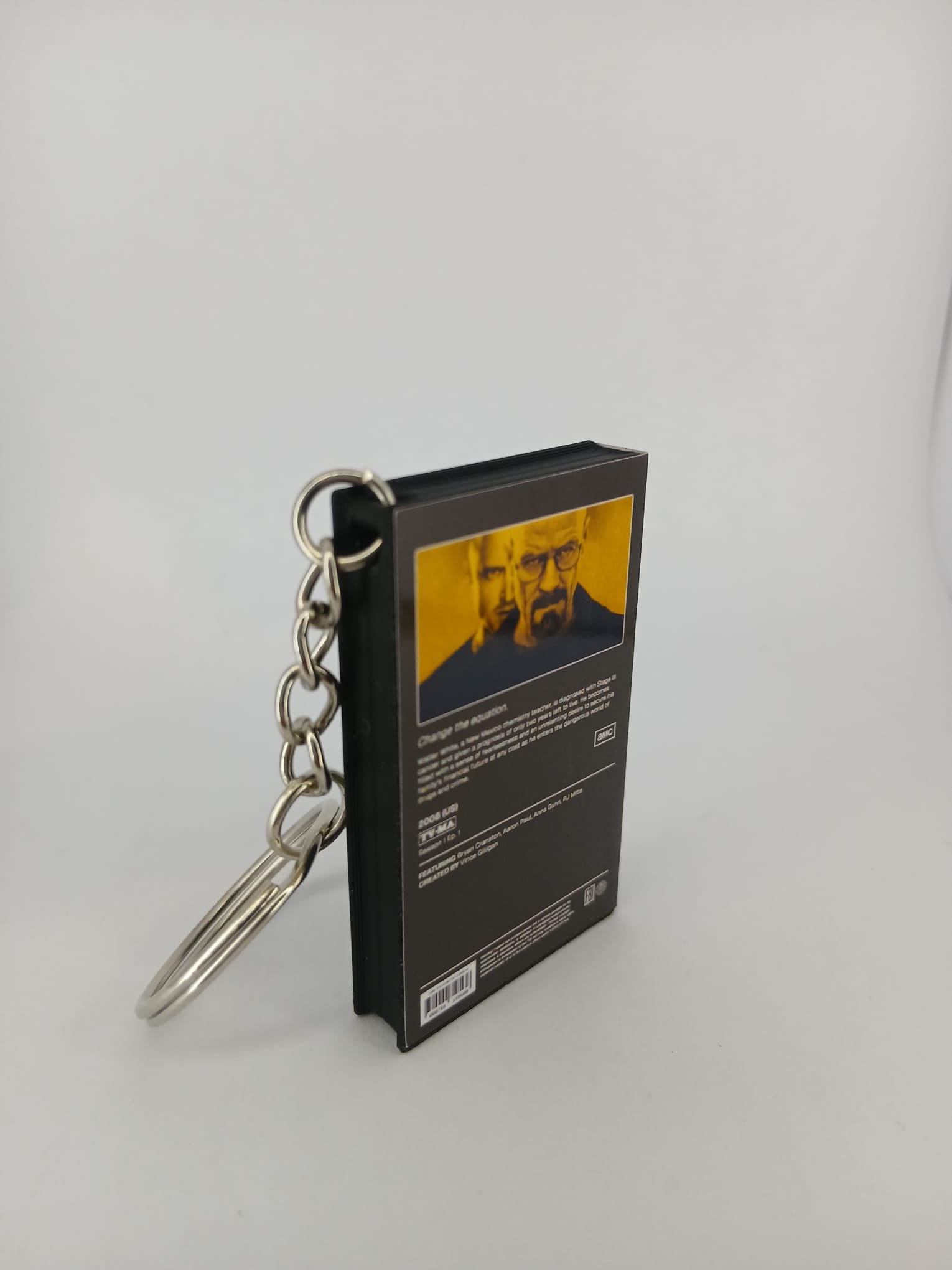 Breaking Bad VHS keyring — front cover flat lay top down