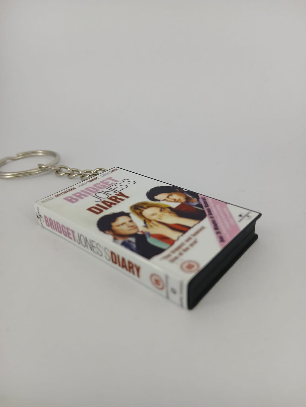 Bridget Jones's Diary VHS keyring — back and spine angled view standing