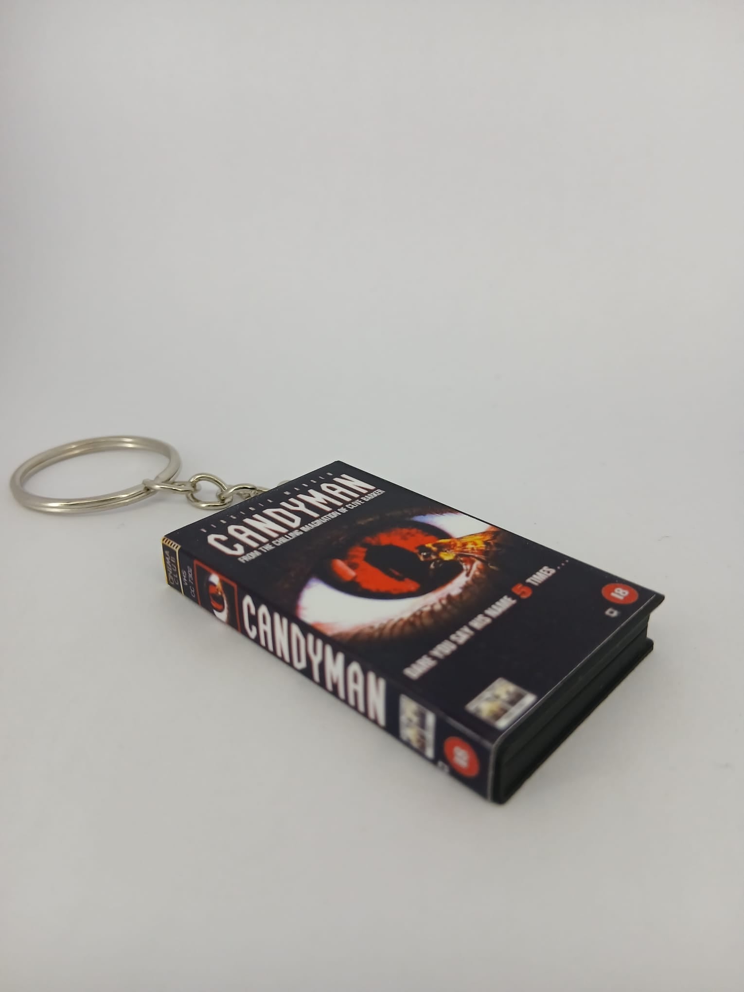 Candyman VHS keyring — back cover standing angled 2