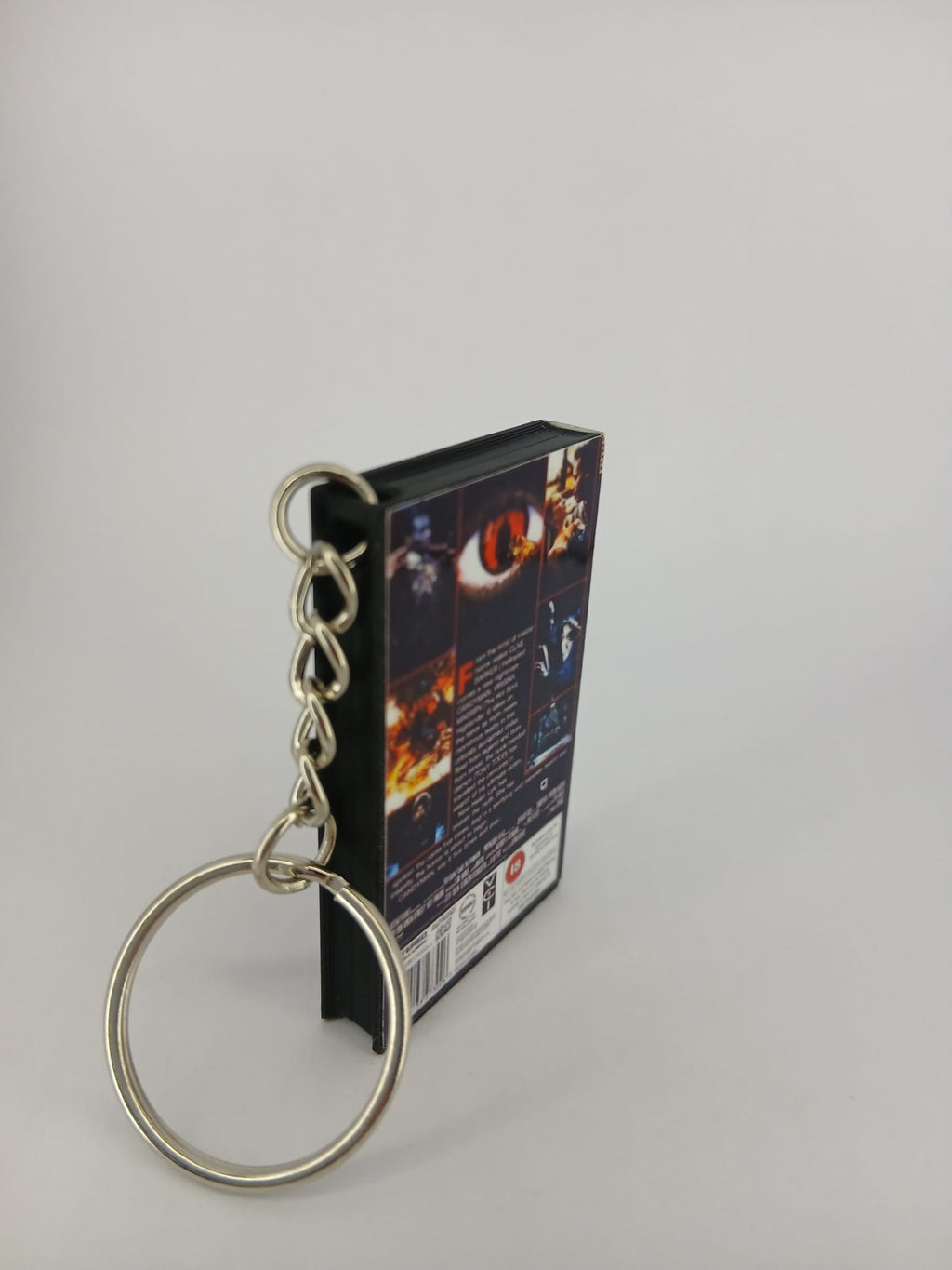 Candyman VHS keyring — spine and back angled view standing