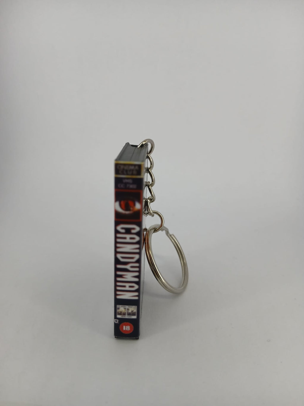 Candyman VHS keyring — front cover standing angled
