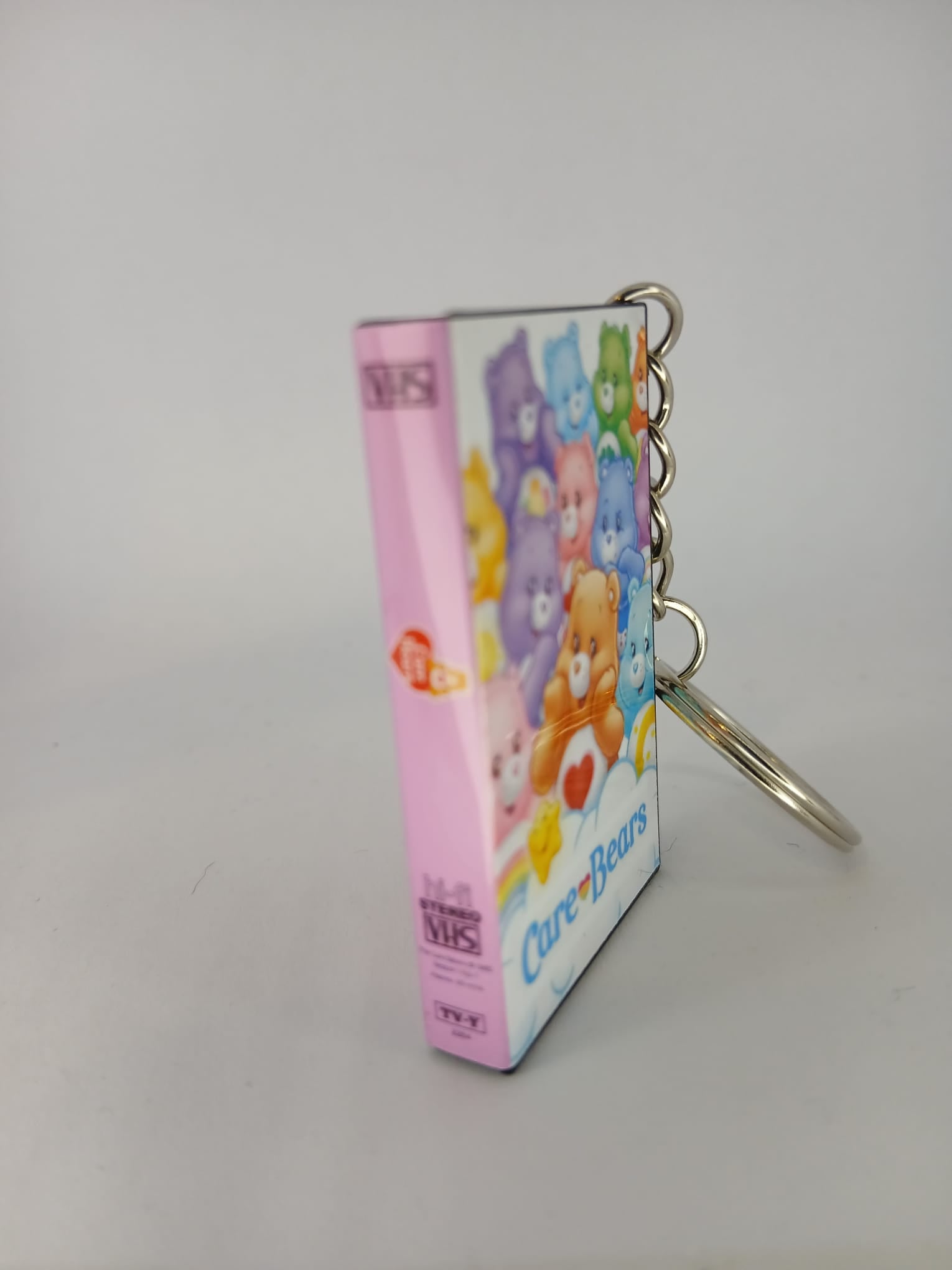 Care Bears VHS keyring size comparison