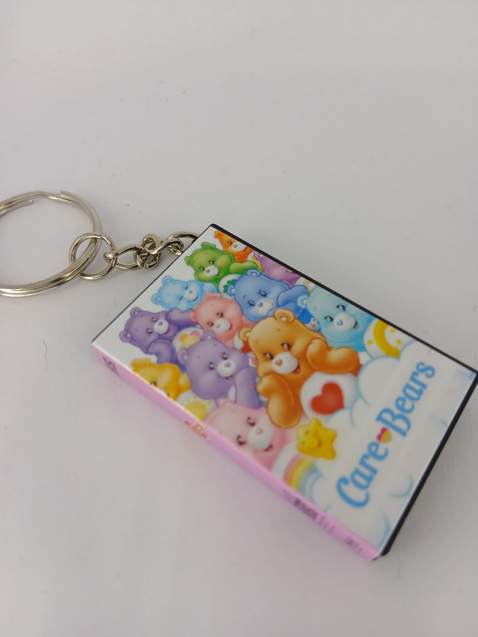 Care Bears VHS keyring flat lay