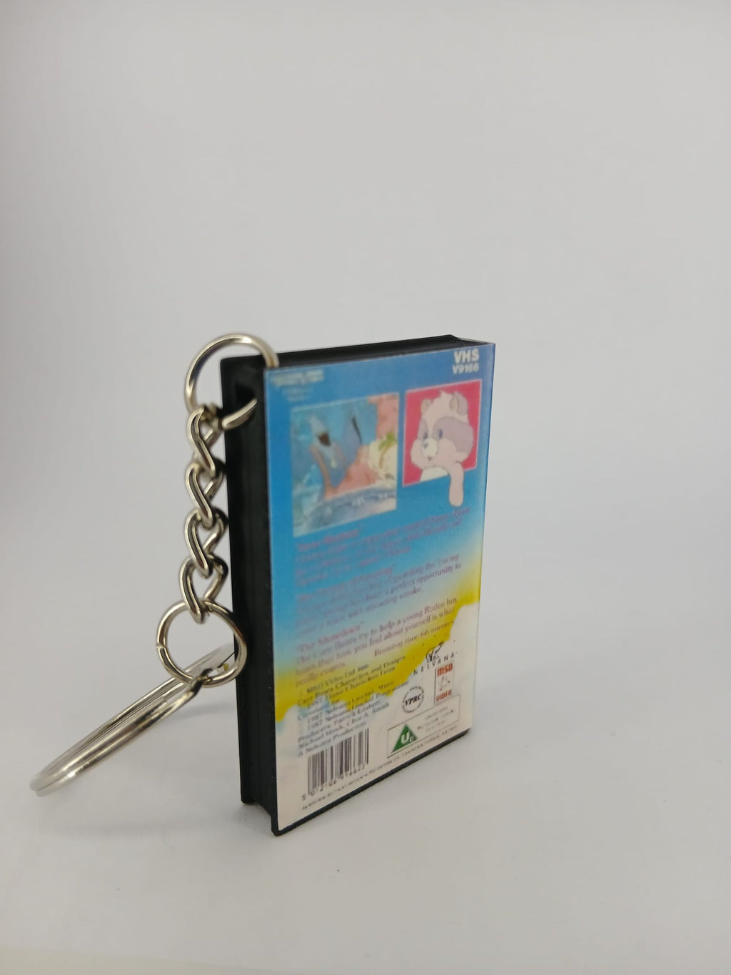 Care Bears VHS keyring — spine and front angled view standing