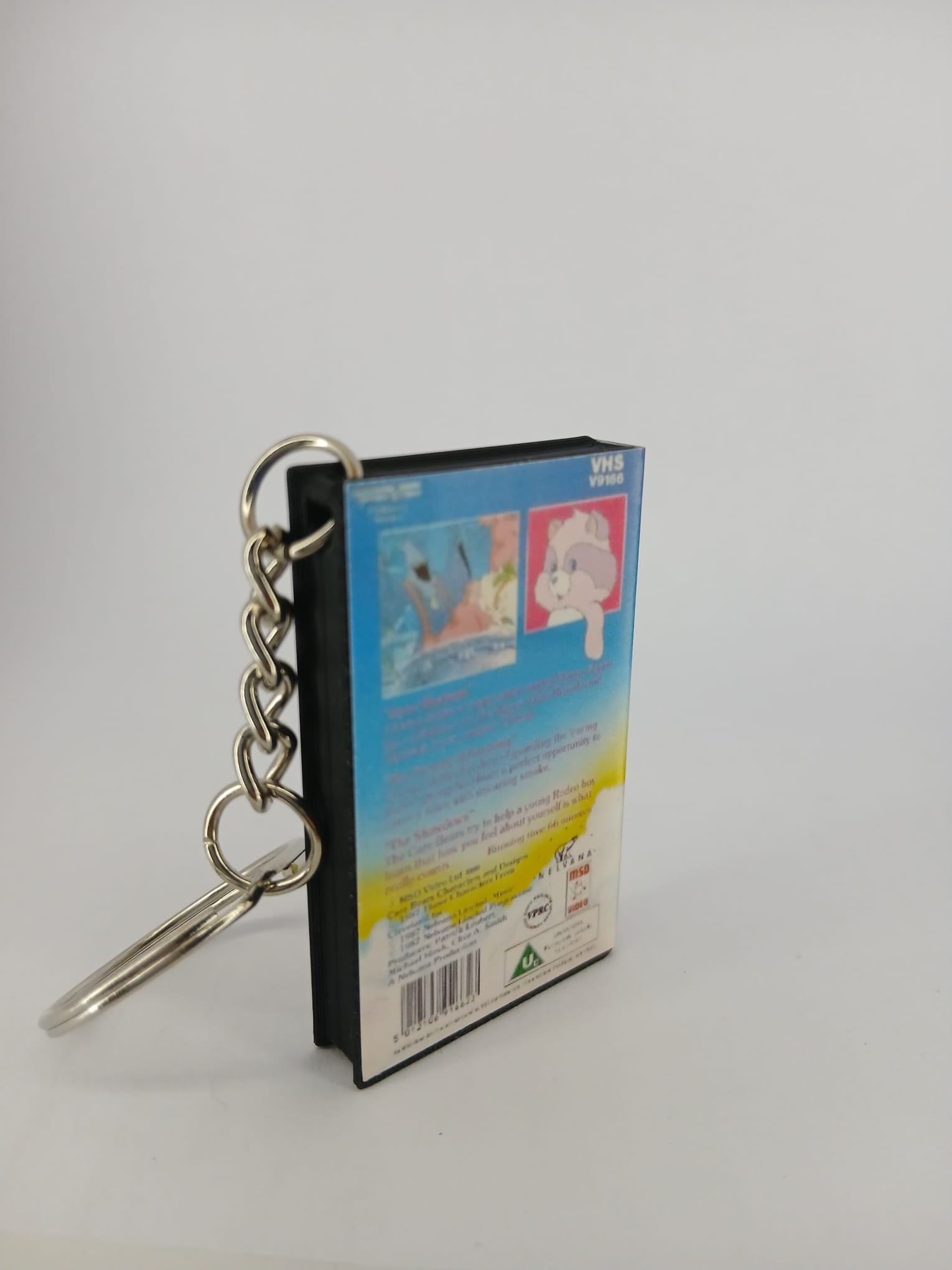 Care Bears VHS keyring — spine and front angled view standing