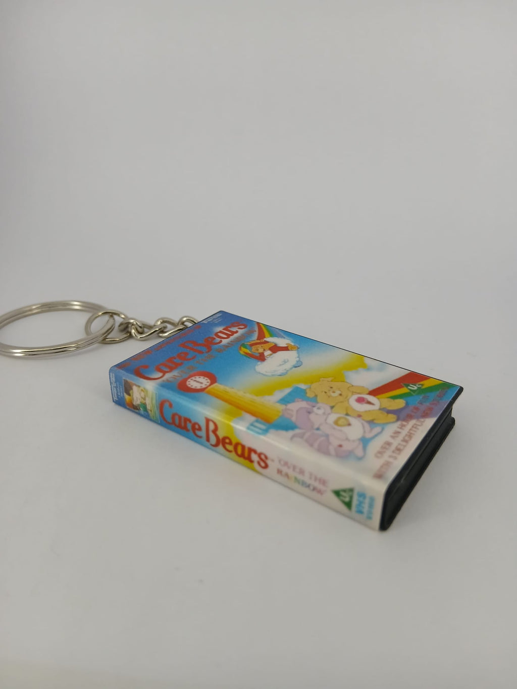 Care Bears VHS keyring — front cover standing angled