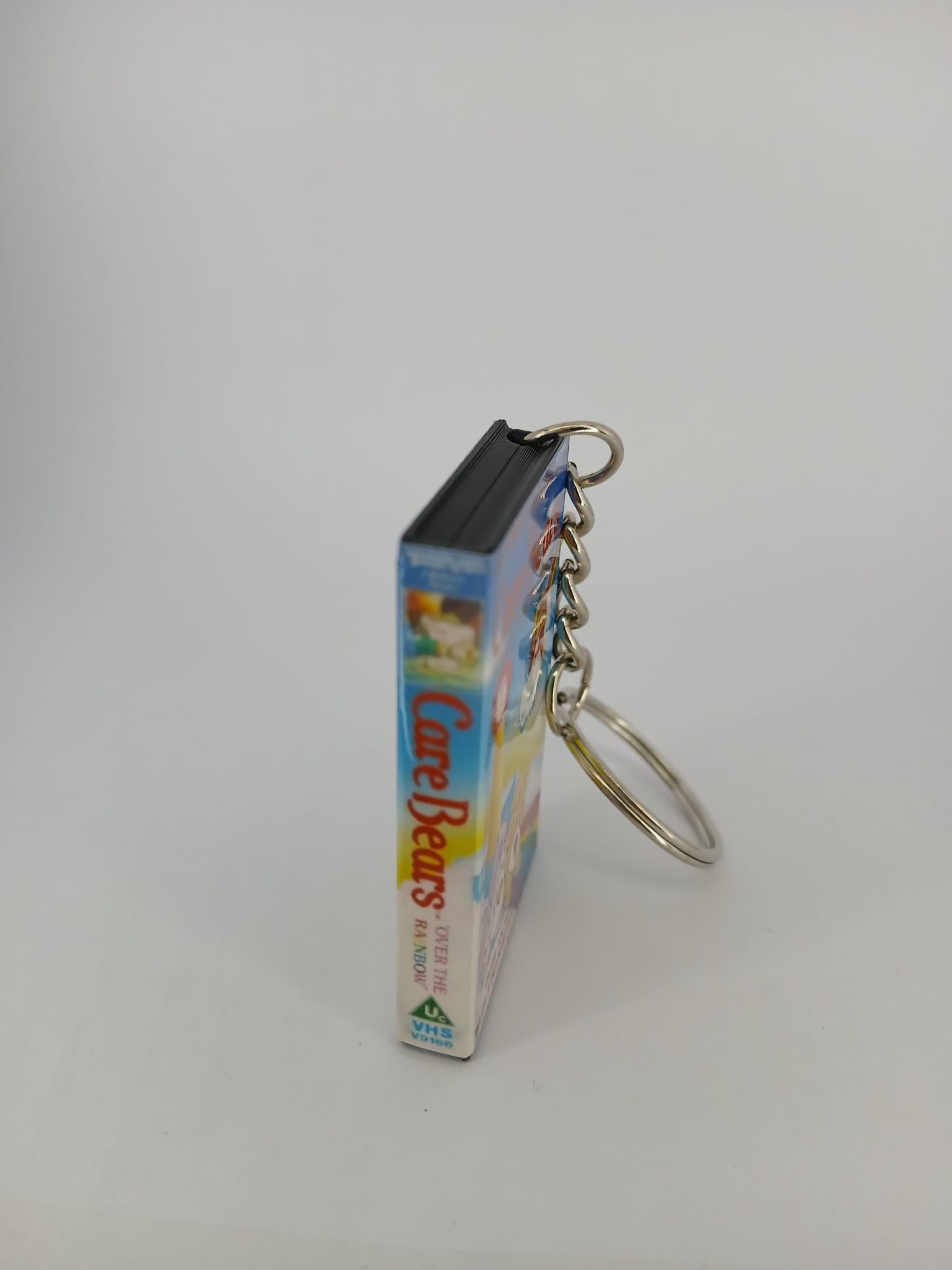 Care Bears VHS keyring — front cover standing angled 2