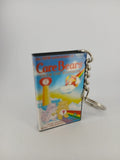 Care Bears VHS keyring — front cover standing angled 3