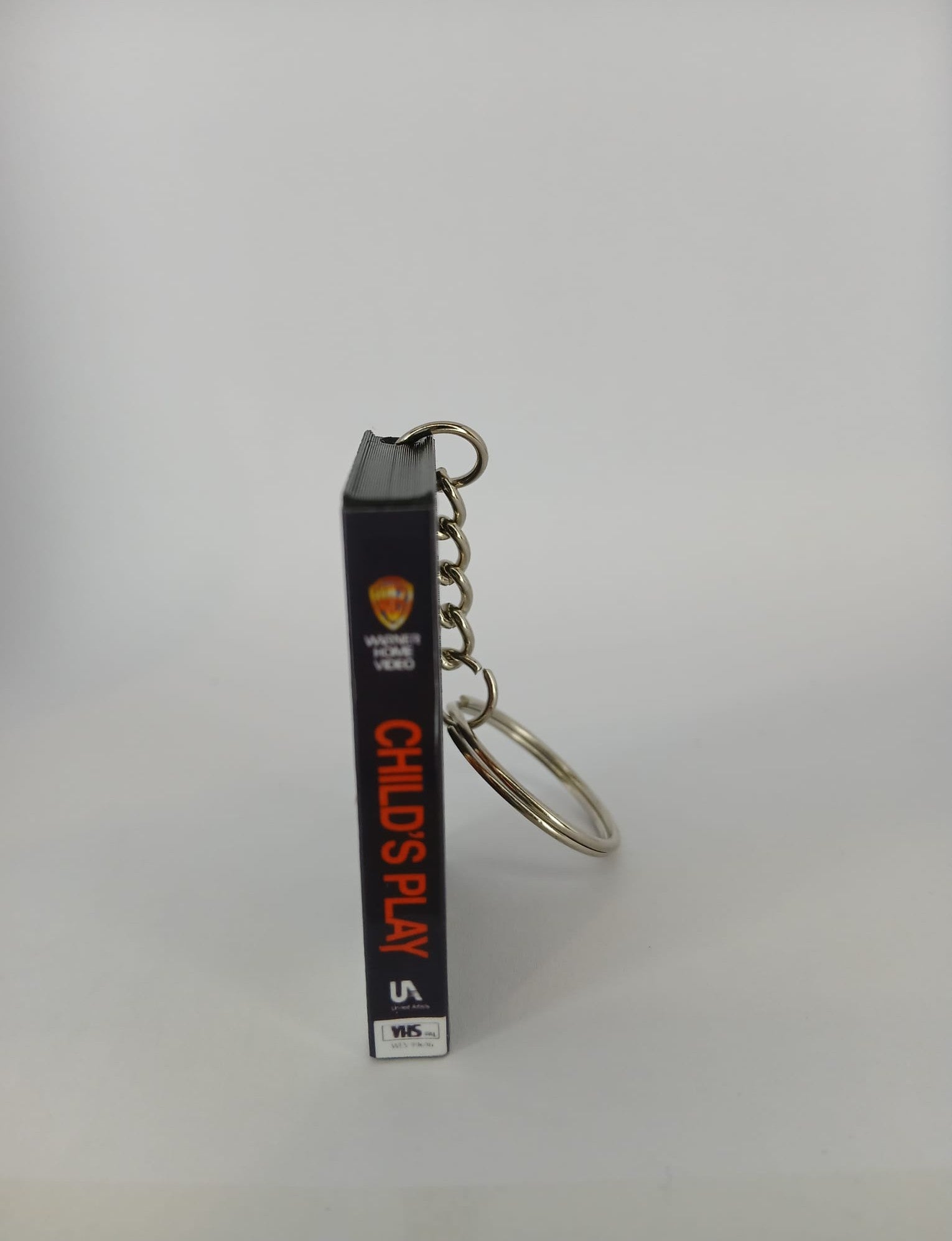 Child's Play Mini VHS Keyring – side edge view