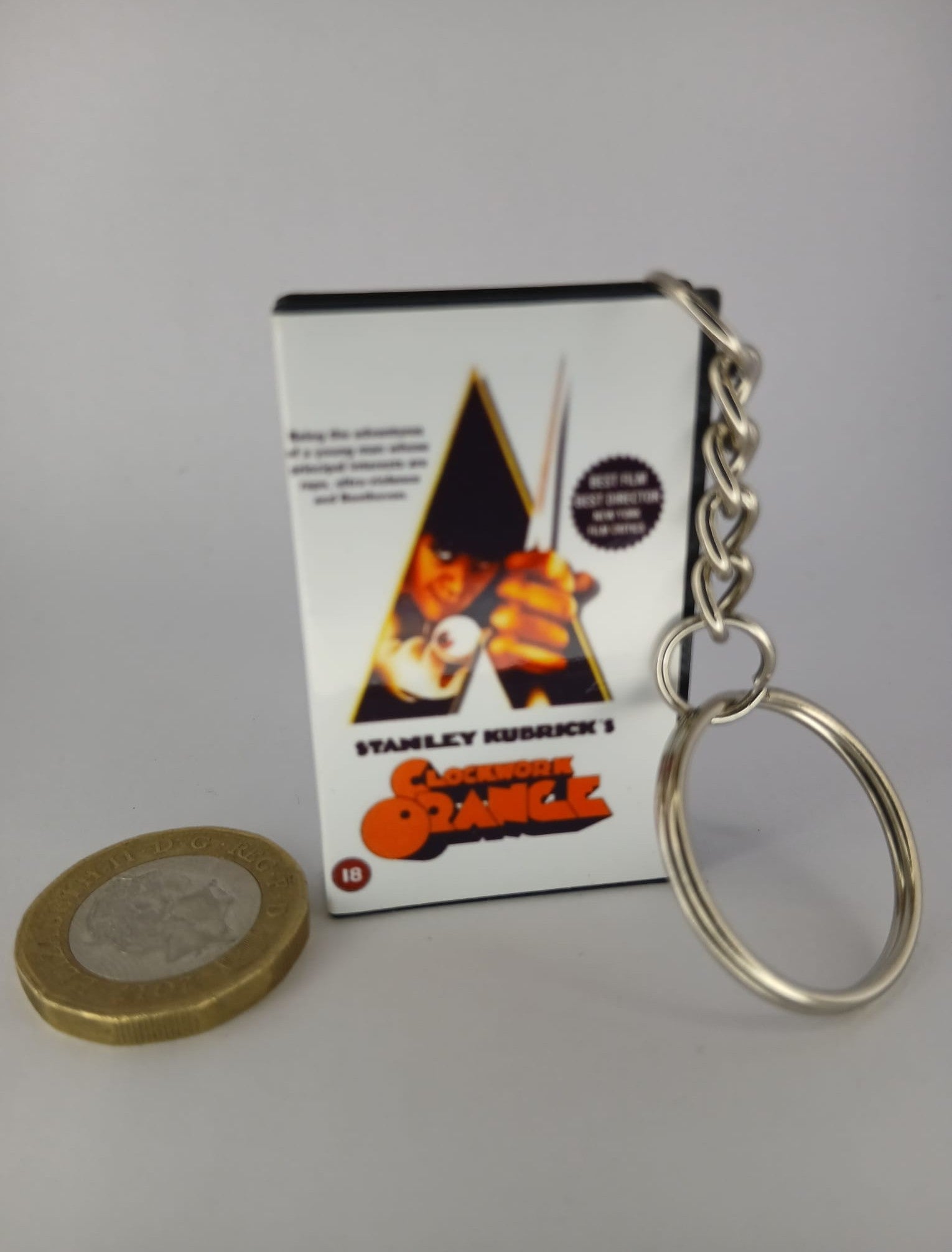 A Clockwork Orange VHS keyring — front cover standing angled 4