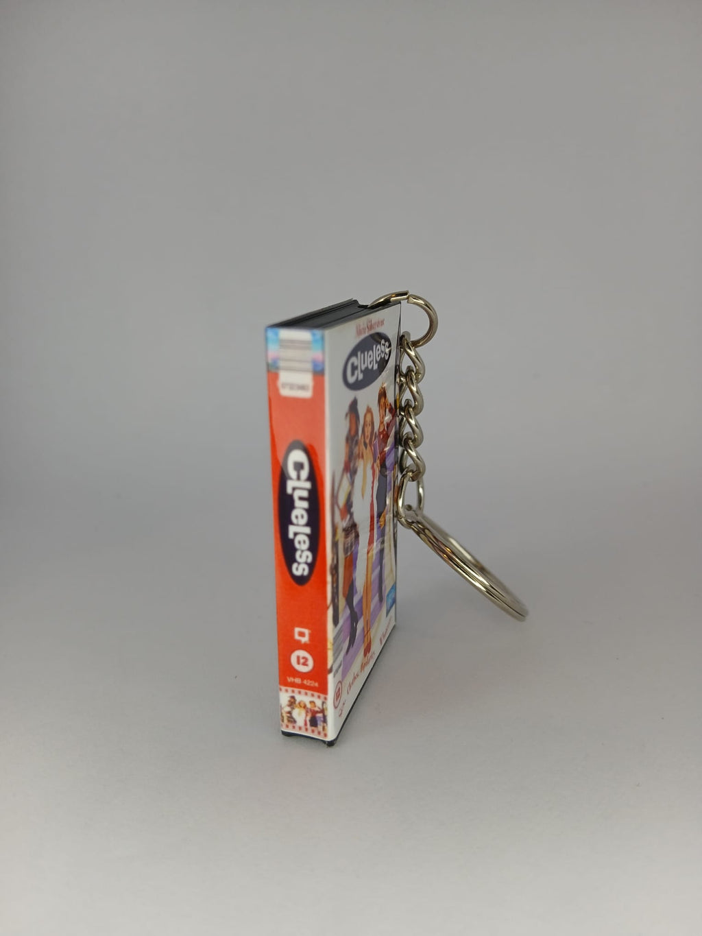 Clueless Mini VHS Keyring – back spine angle low standing