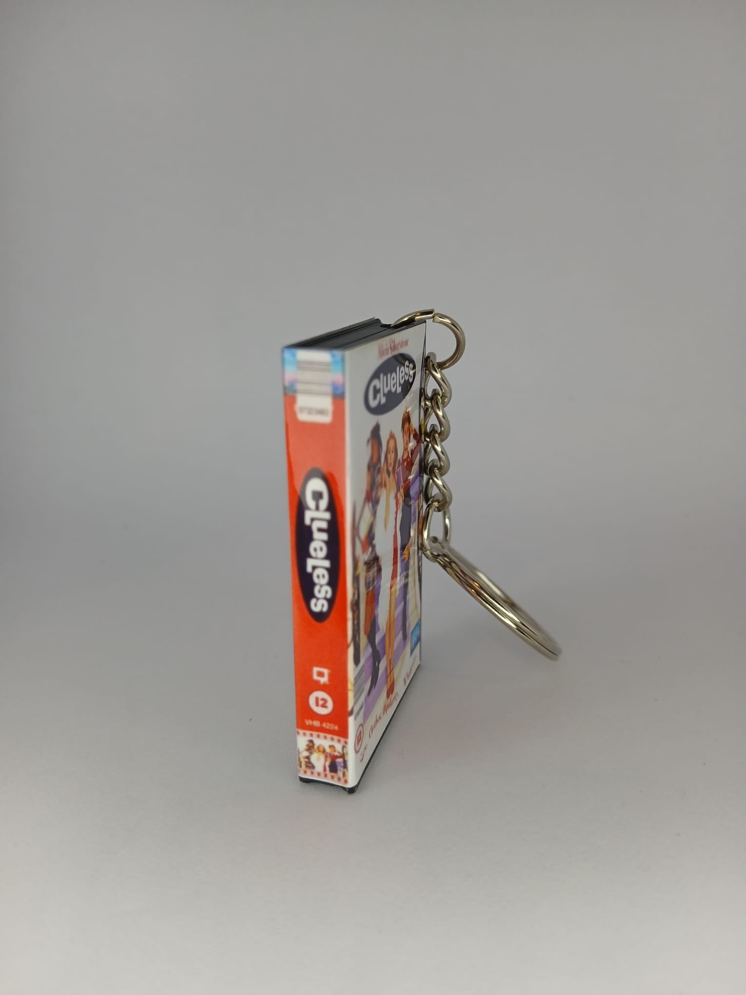 Clueless Mini VHS Keyring – back spine angle low standing