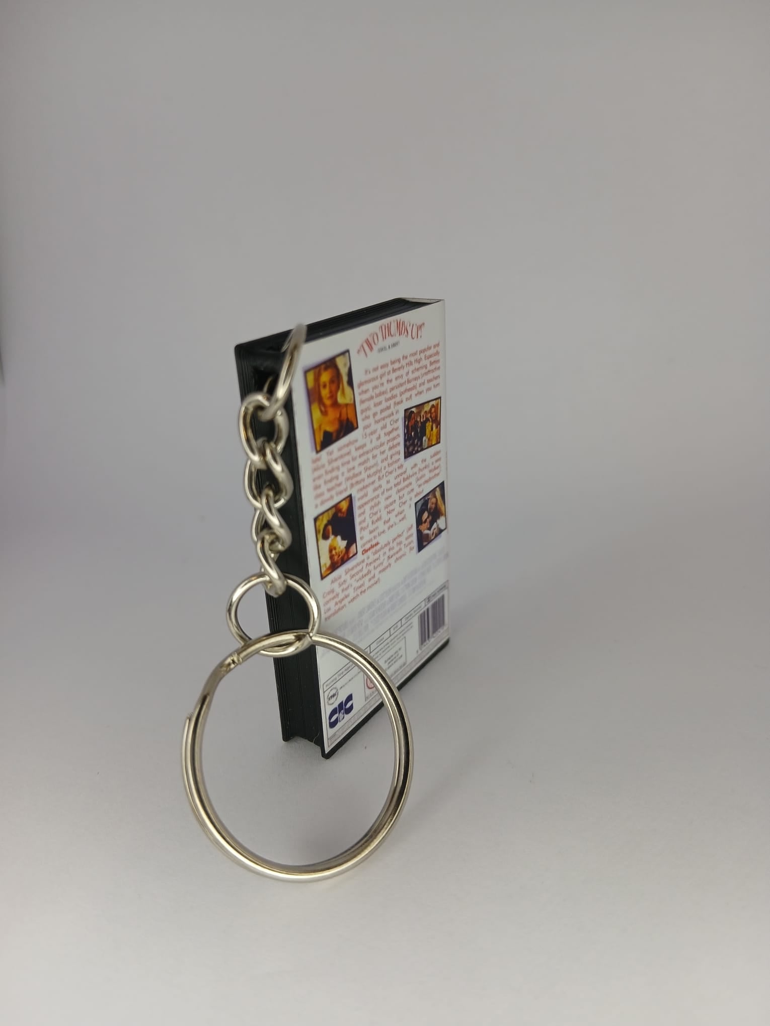 Clueless Mini VHS Keyring – flat lay spine angle close