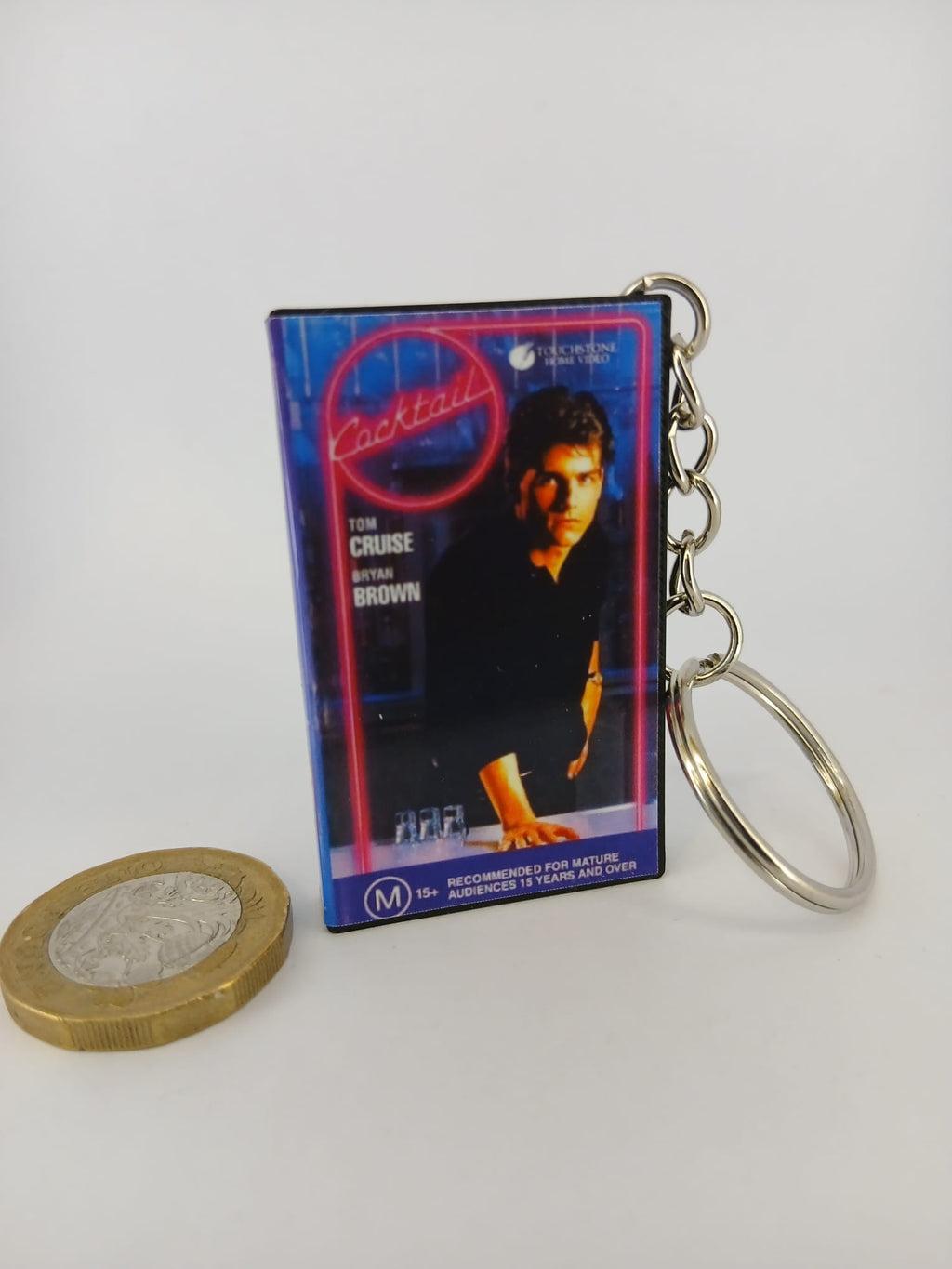 Cocktail VHS keyring — front cover standing angled 2