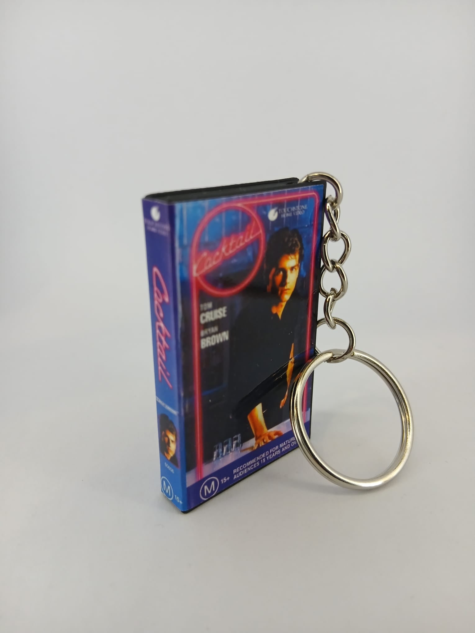 Cocktail VHS keyring — back cover standing