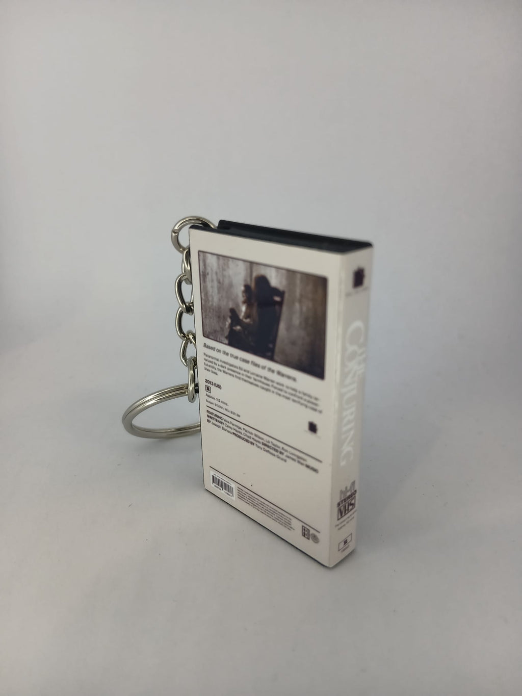 The Conjuring VHS keyring — back cover detail