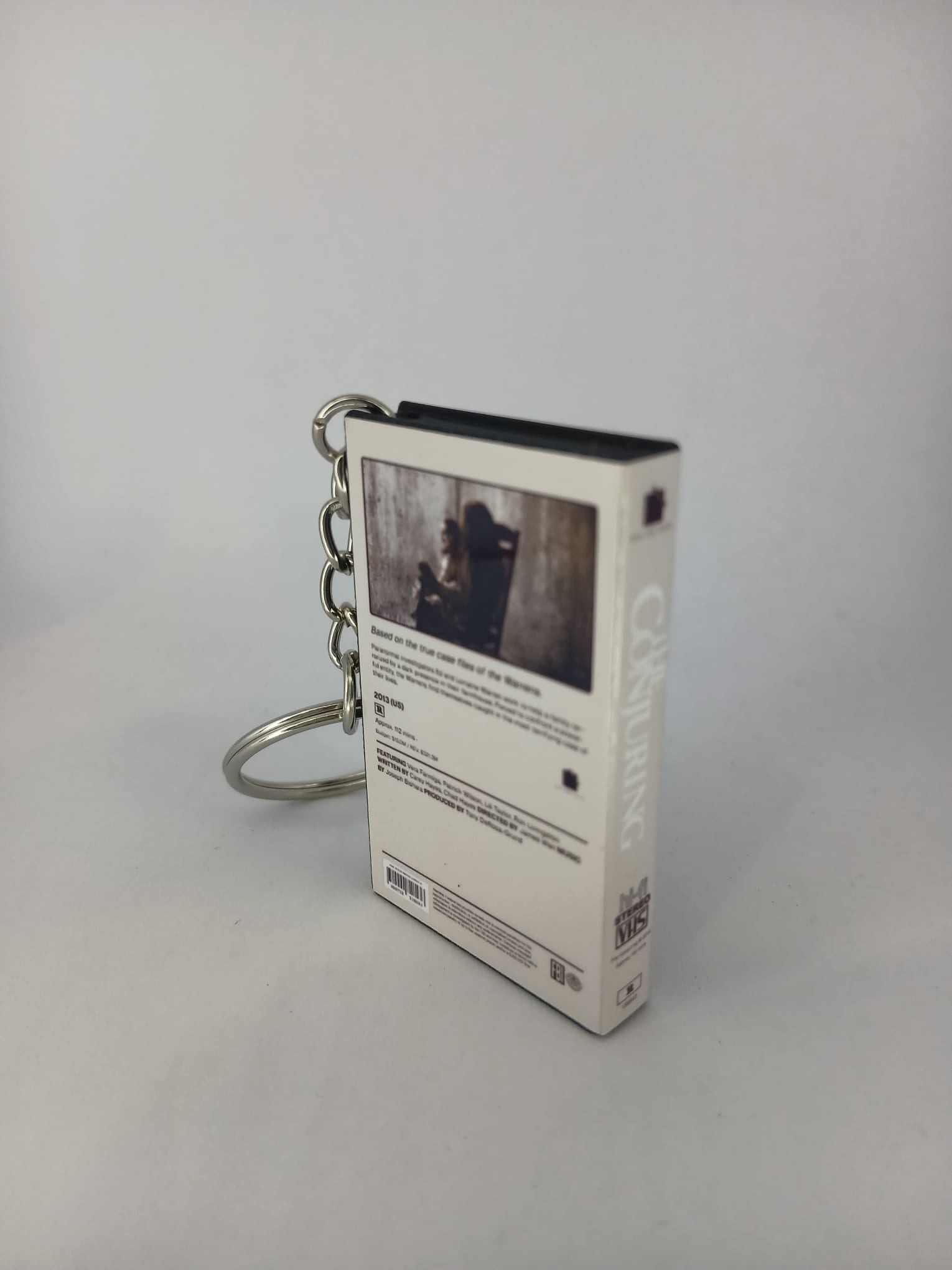 The Conjuring VHS keyring — back cover detail