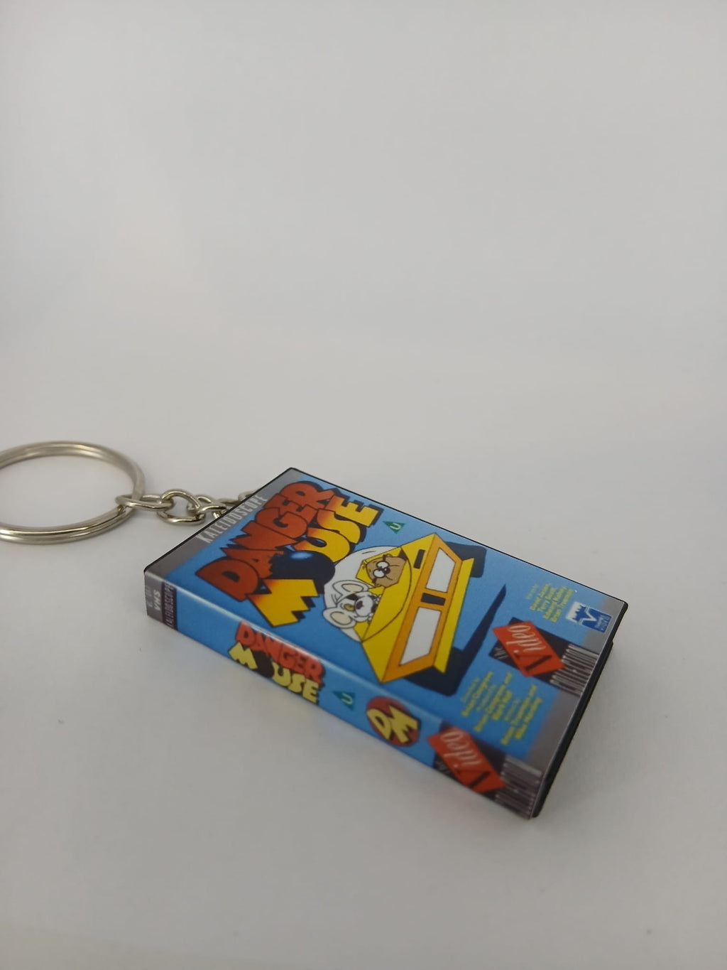 Danger Mouse VHS keyring — spine view standing 2