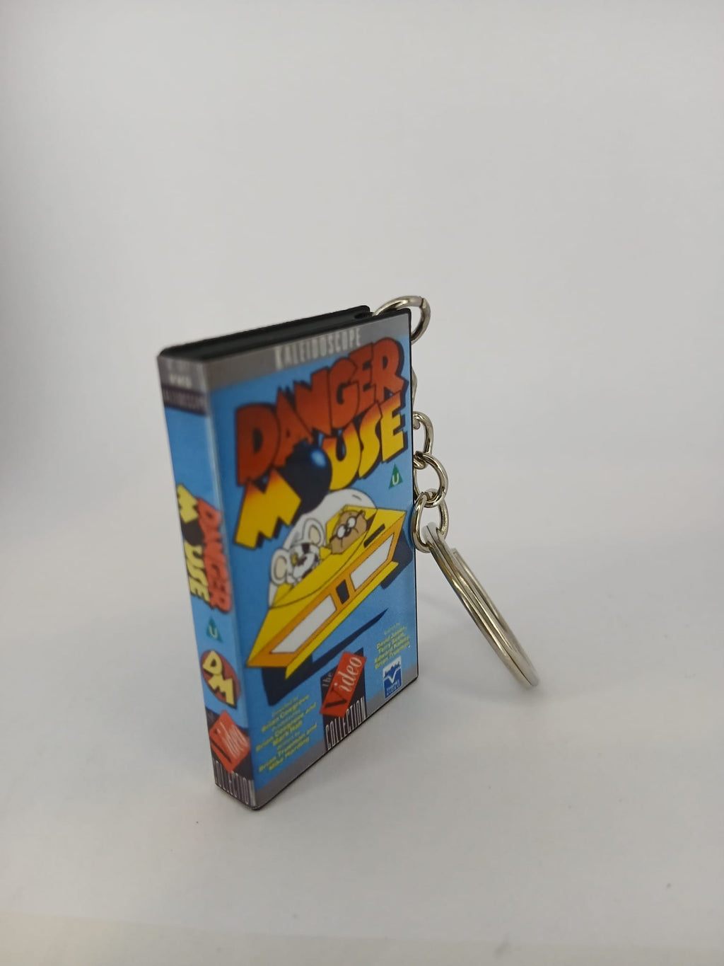 Danger Mouse VHS keyring — front cover standing angled 2