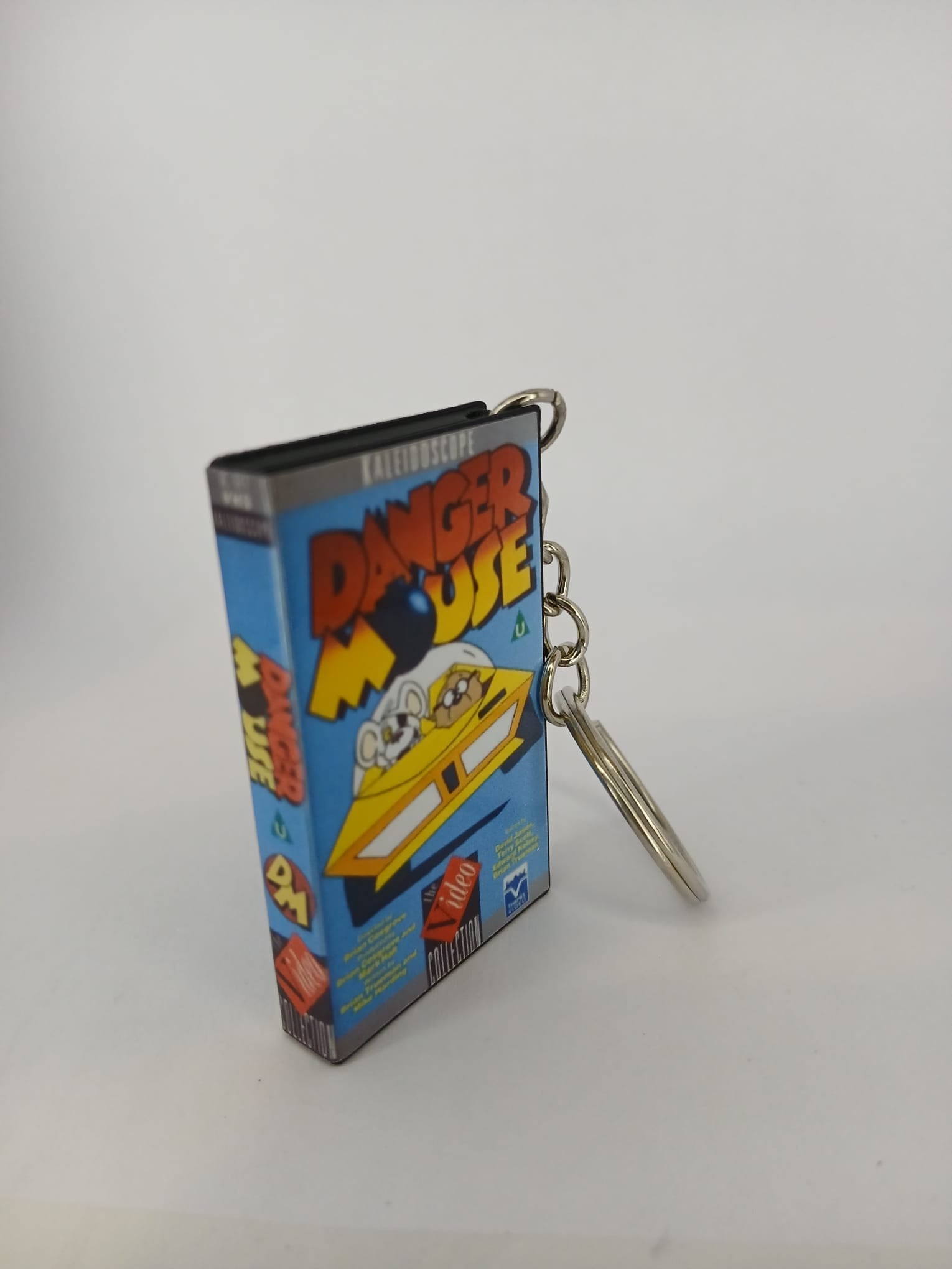 Danger Mouse VHS keyring — front cover standing angled 2