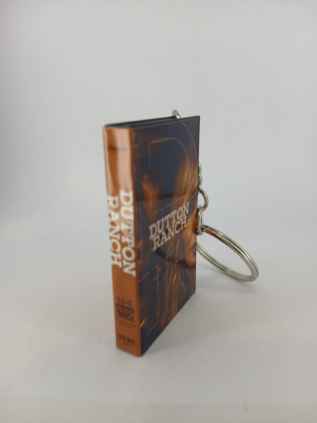 Dutton Ranch VHS keyring — back cover standing