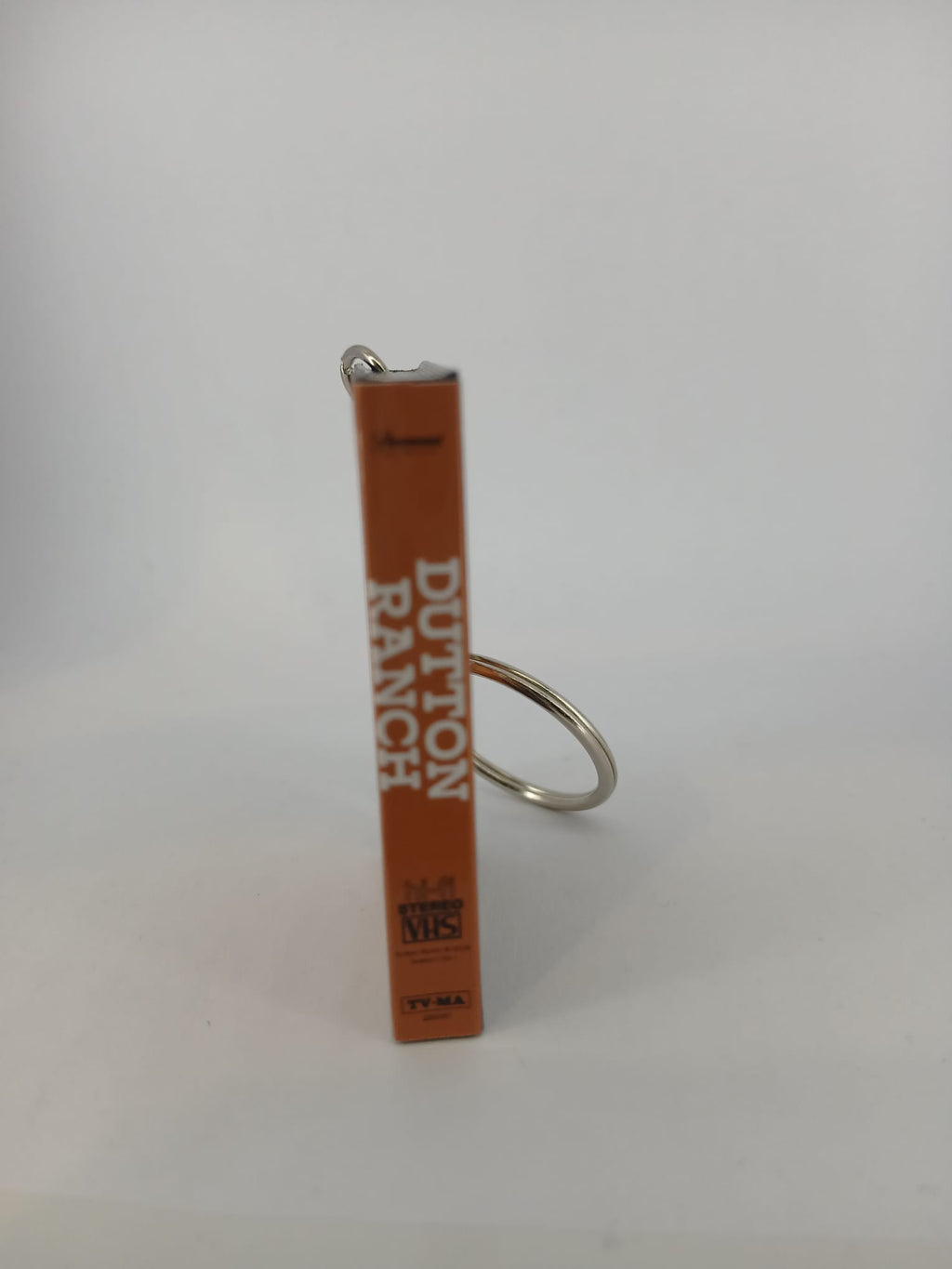Dutton Ranch VHS keyring — front and spine flat lay angled