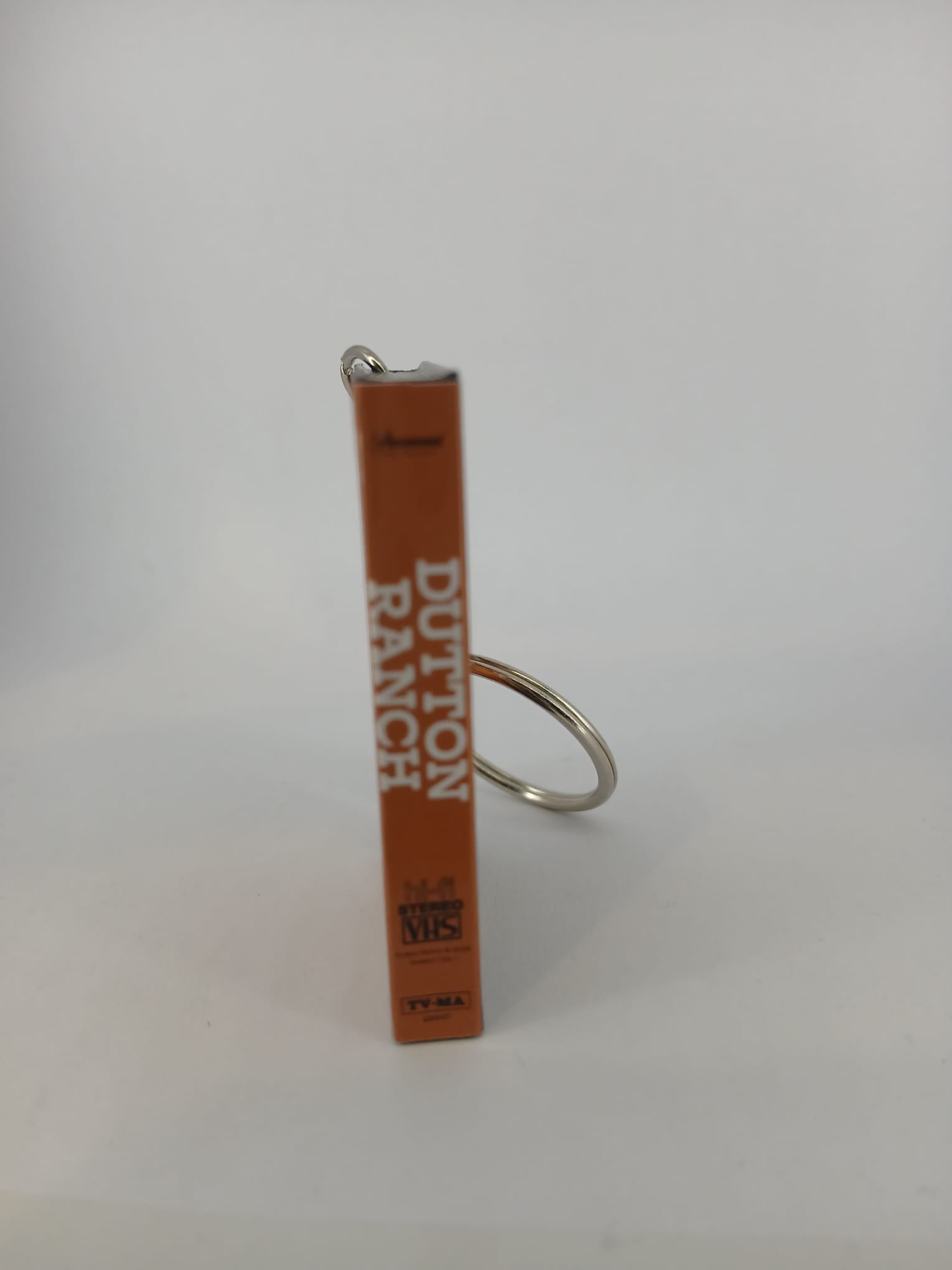 Dutton Ranch VHS keyring — front and spine flat lay angled