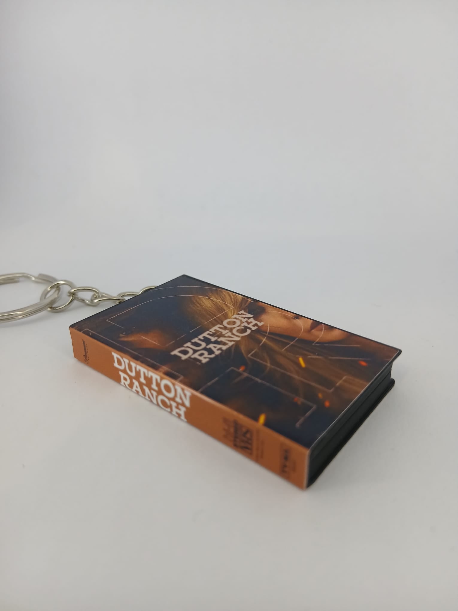 Dutton Ranch VHS keyring — front cover flat lay angled 3