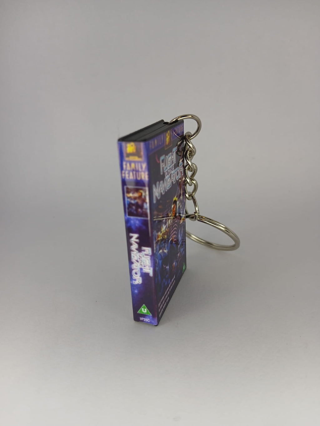 Flight of the Navigator Mini VHS Keyring – front with coin standing