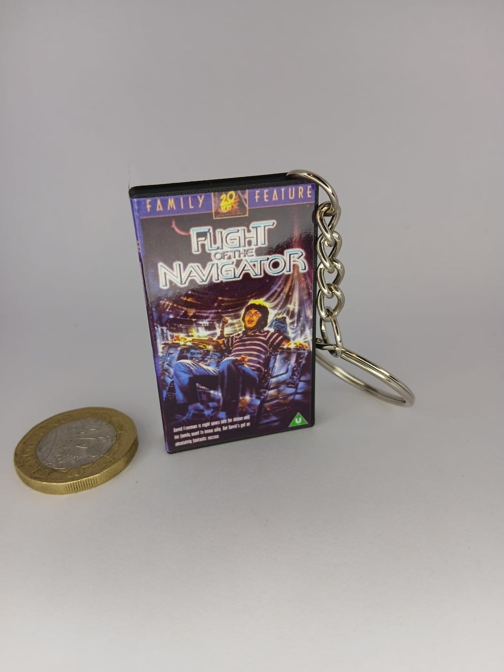 Flight of the Navigator Mini VHS Keyring – back with chain standing