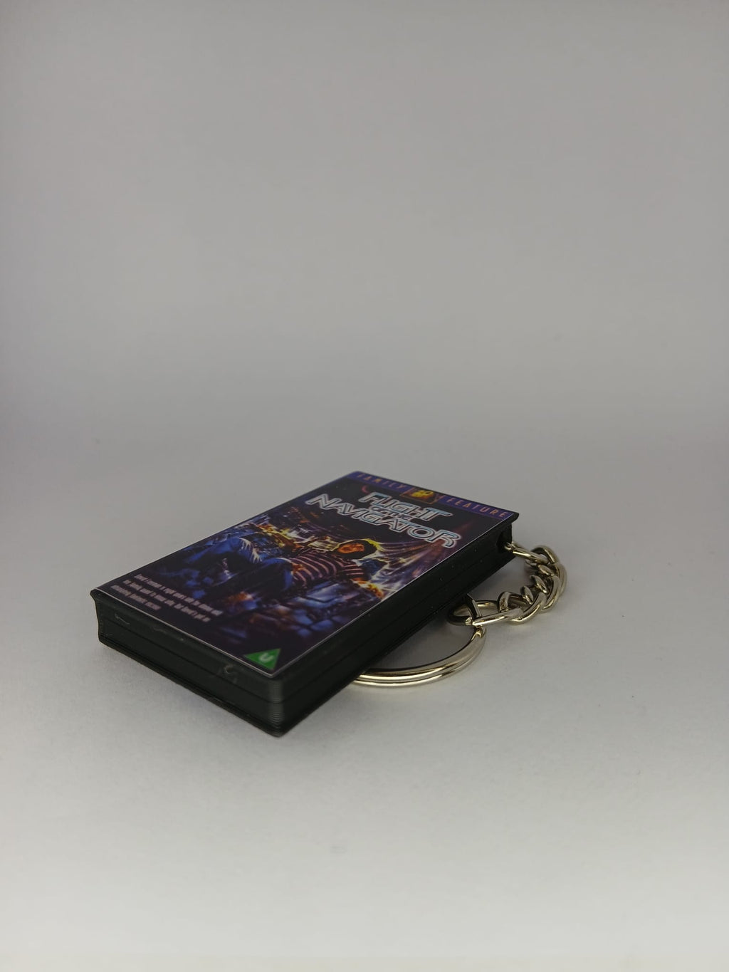 Flight of the Navigator Mini VHS Keyring – front spine angle standing