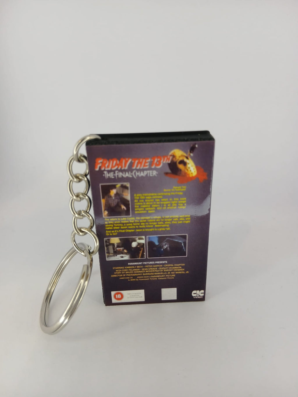 Friday the 13th The Final Chapter VHS keyring — back and spine angled view